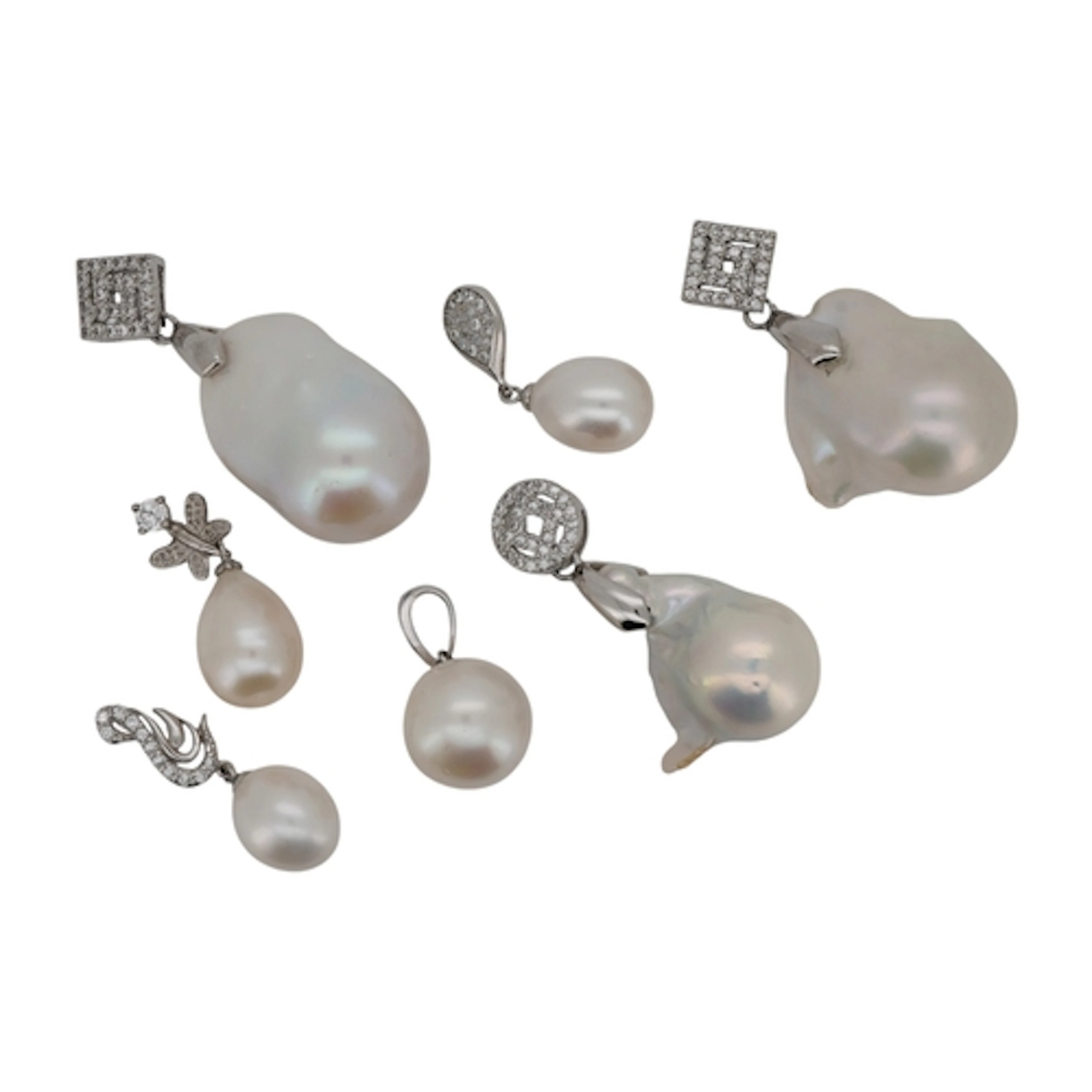 A collection of cultured pearl and simulant diamond pendants...
