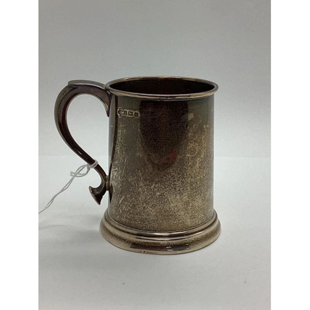 A Hallmarked Silver Mug, Messrs Hutton, Birmingham 1925, of ...