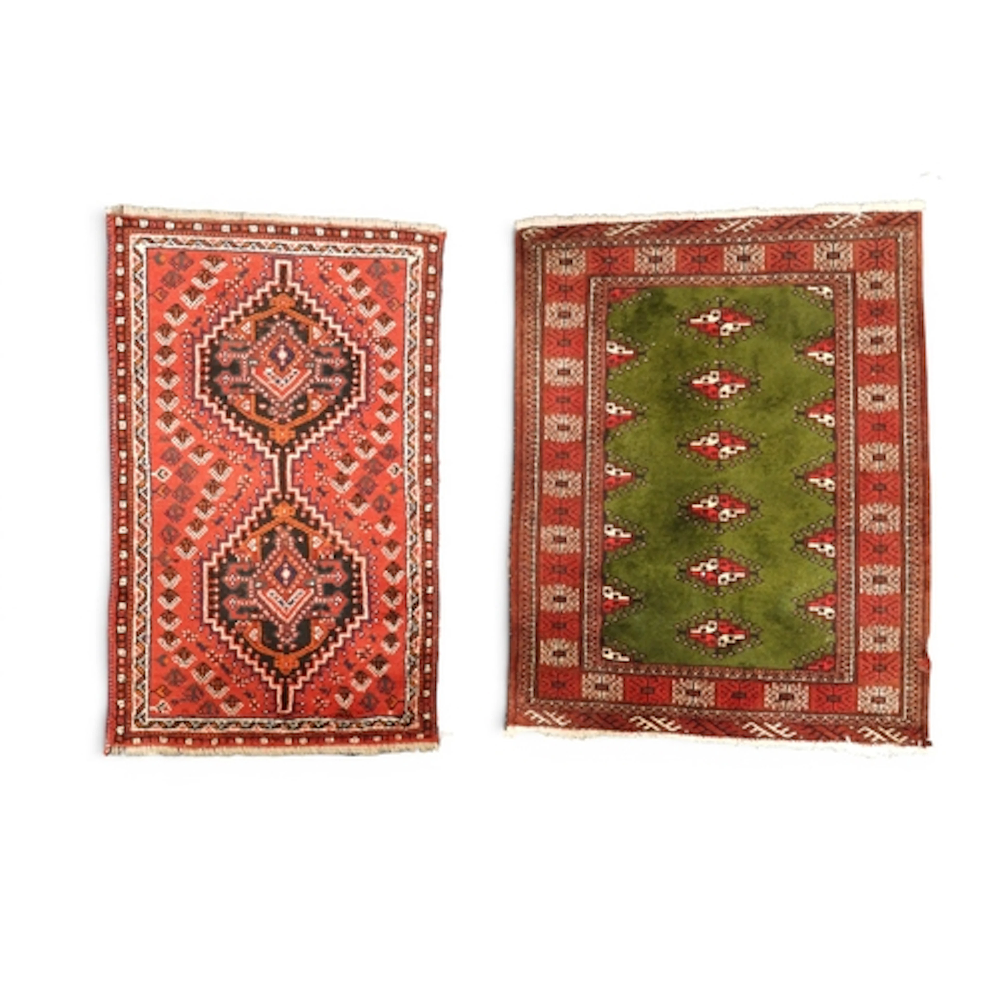 A lot comprising a small red ground Hamadan rug with two dar...