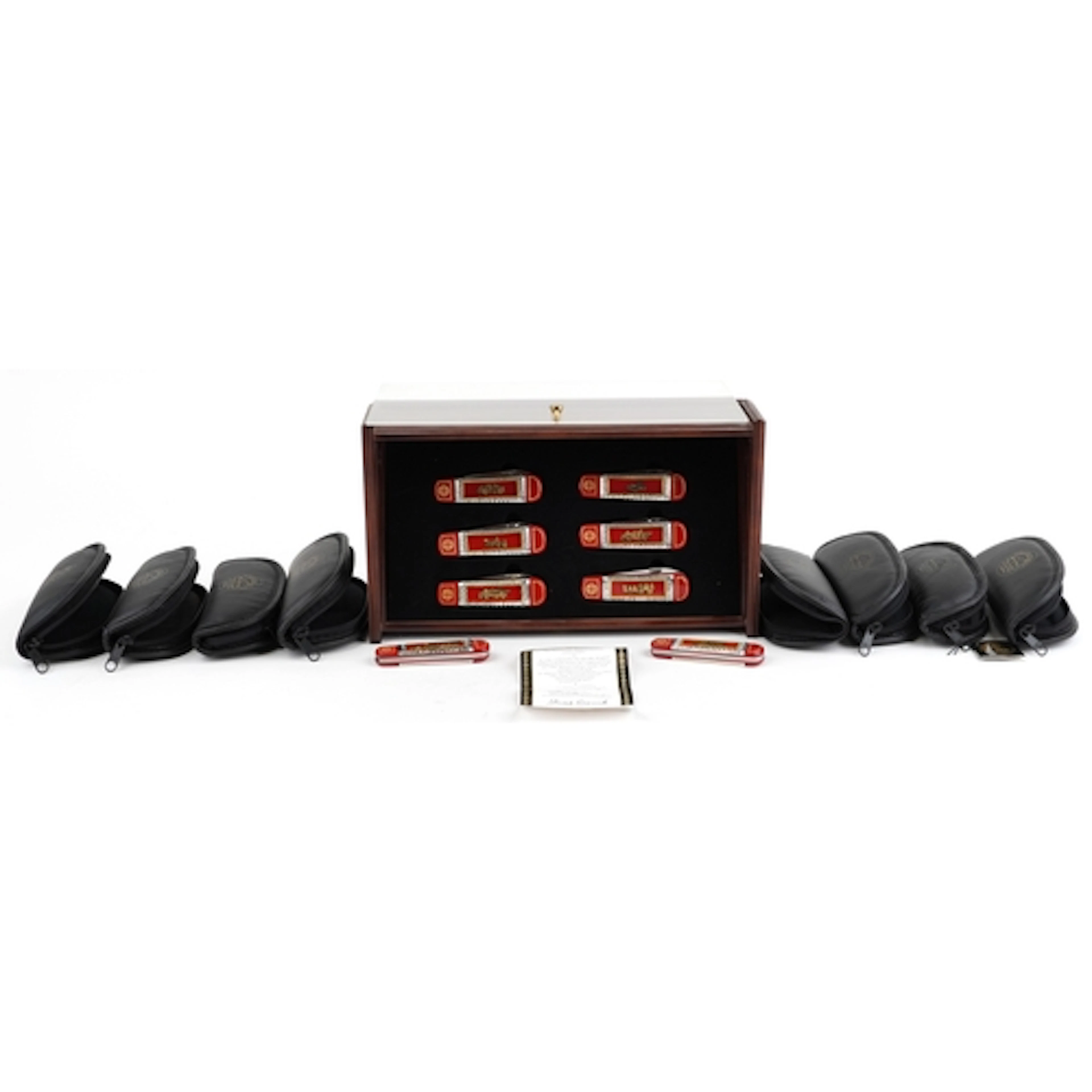 Eight Franklin Mint collector's folding pocket knives with a...