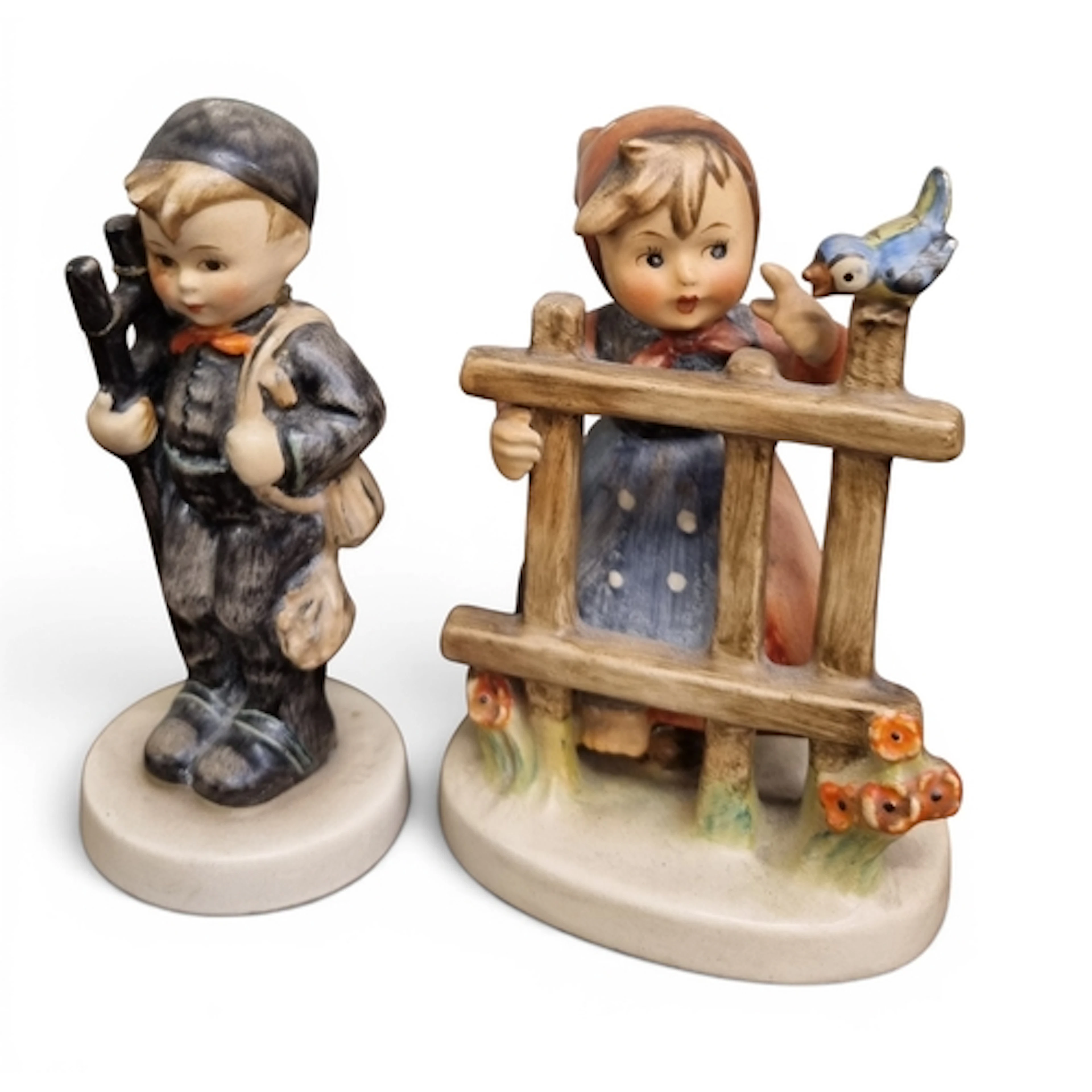 Two Gobel figures along with two Royal Doulton style figures...