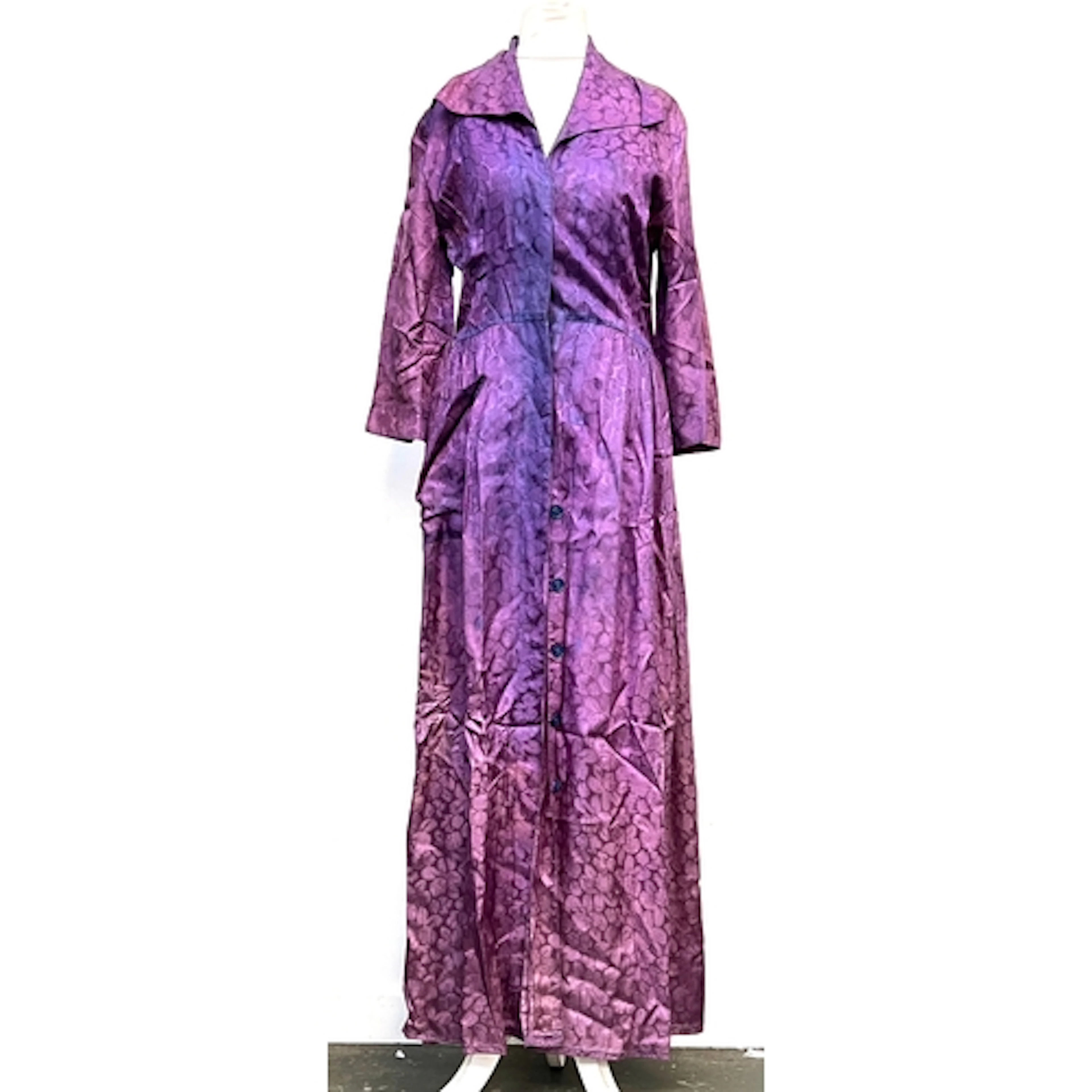 An early 20th century purple damask silk dress/housecoat, wi...