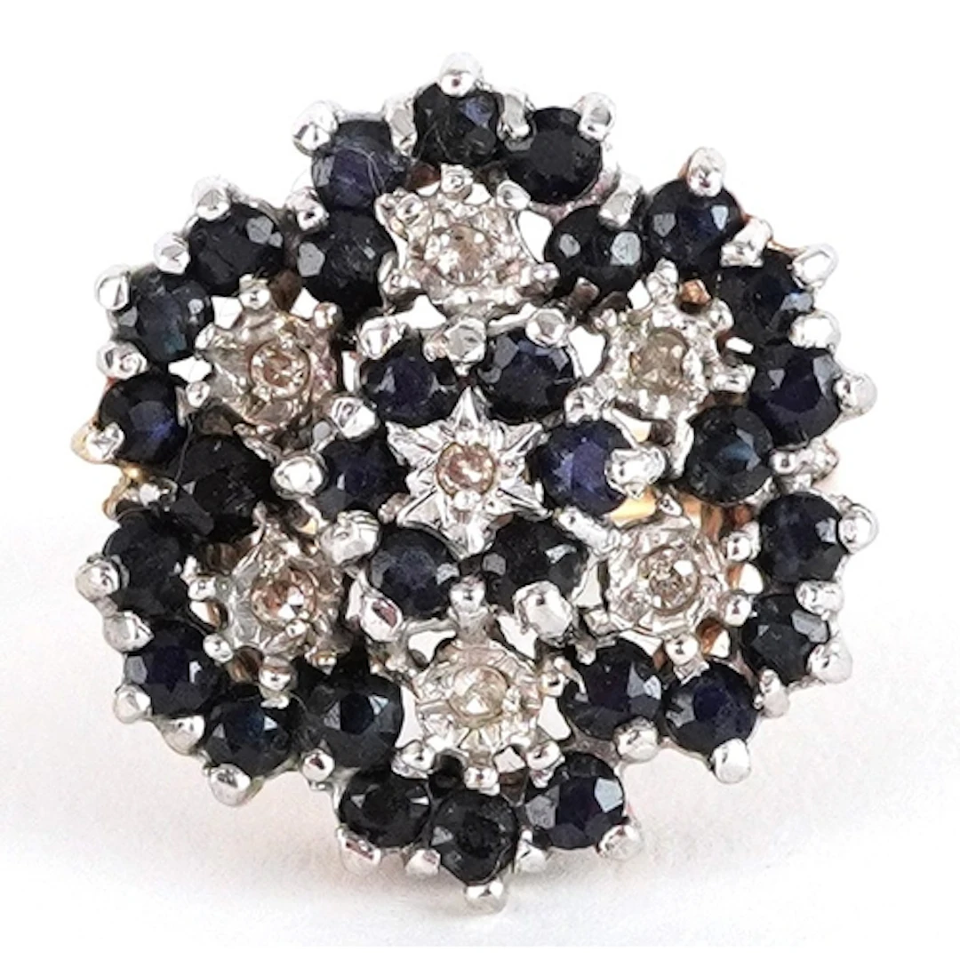 Large 9ct gold diamond and blue spinel flower head ring, siz...