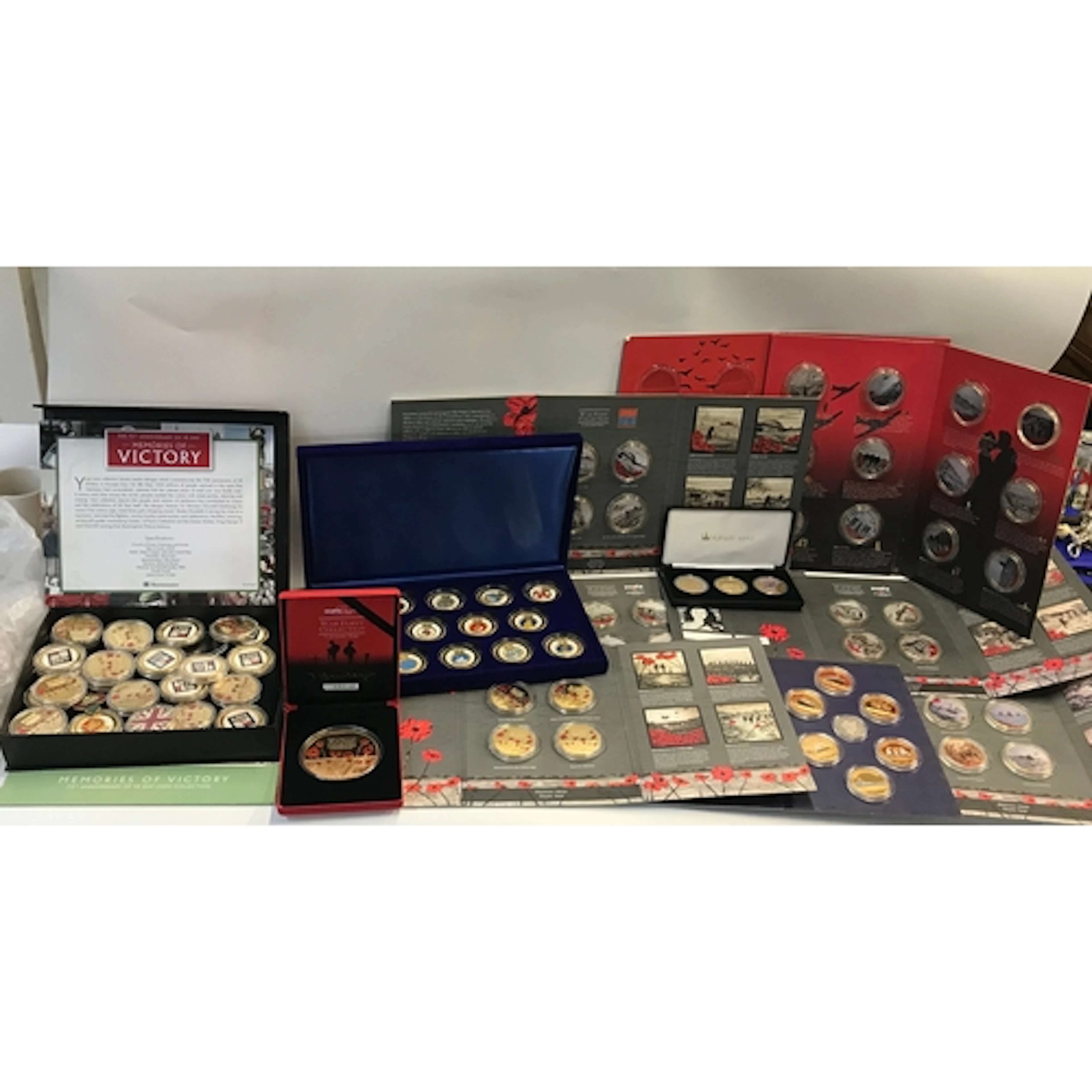 Collection of proof coins, war poppy collection, etc.