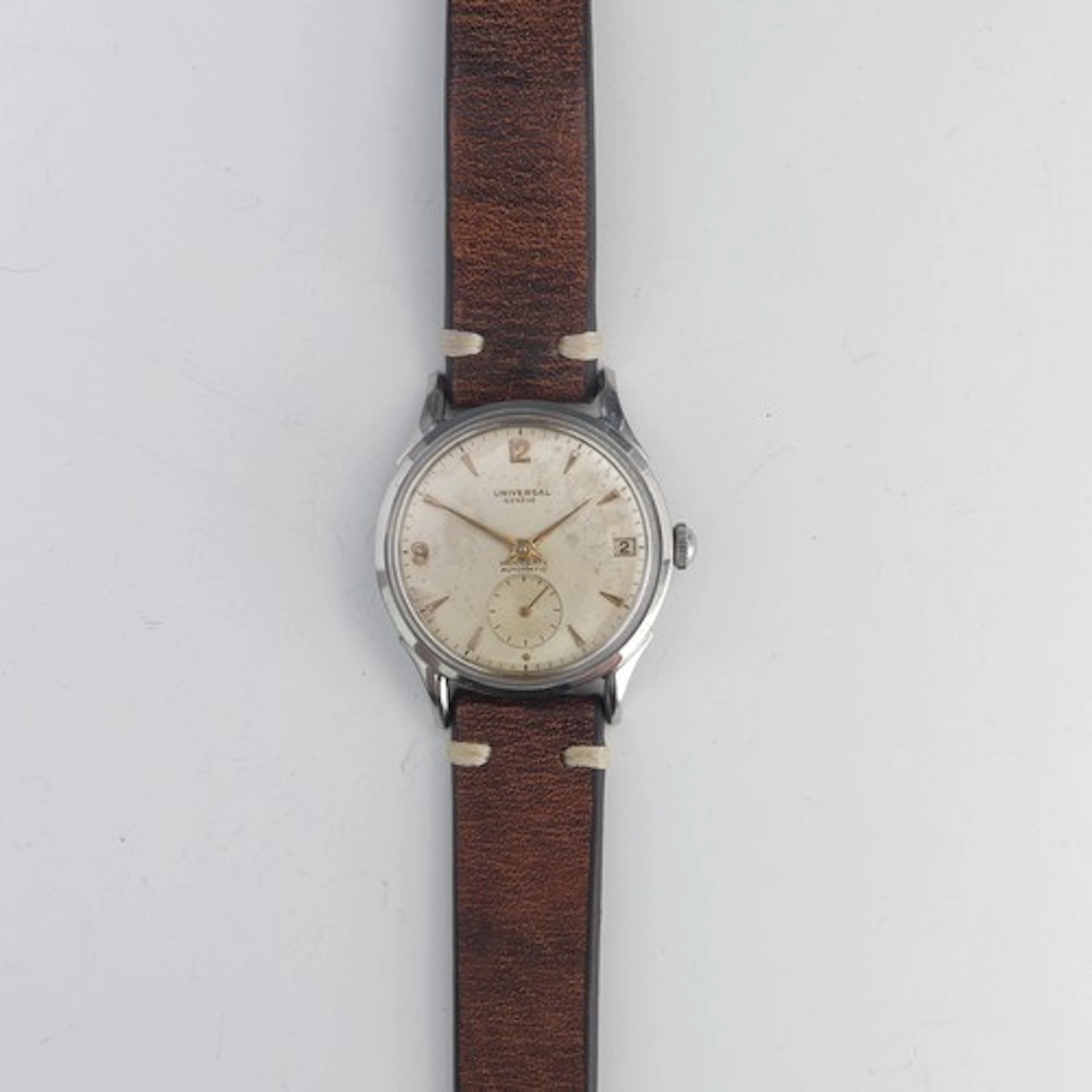 A Universal Genève automatic monodate stainless steel Wristw...