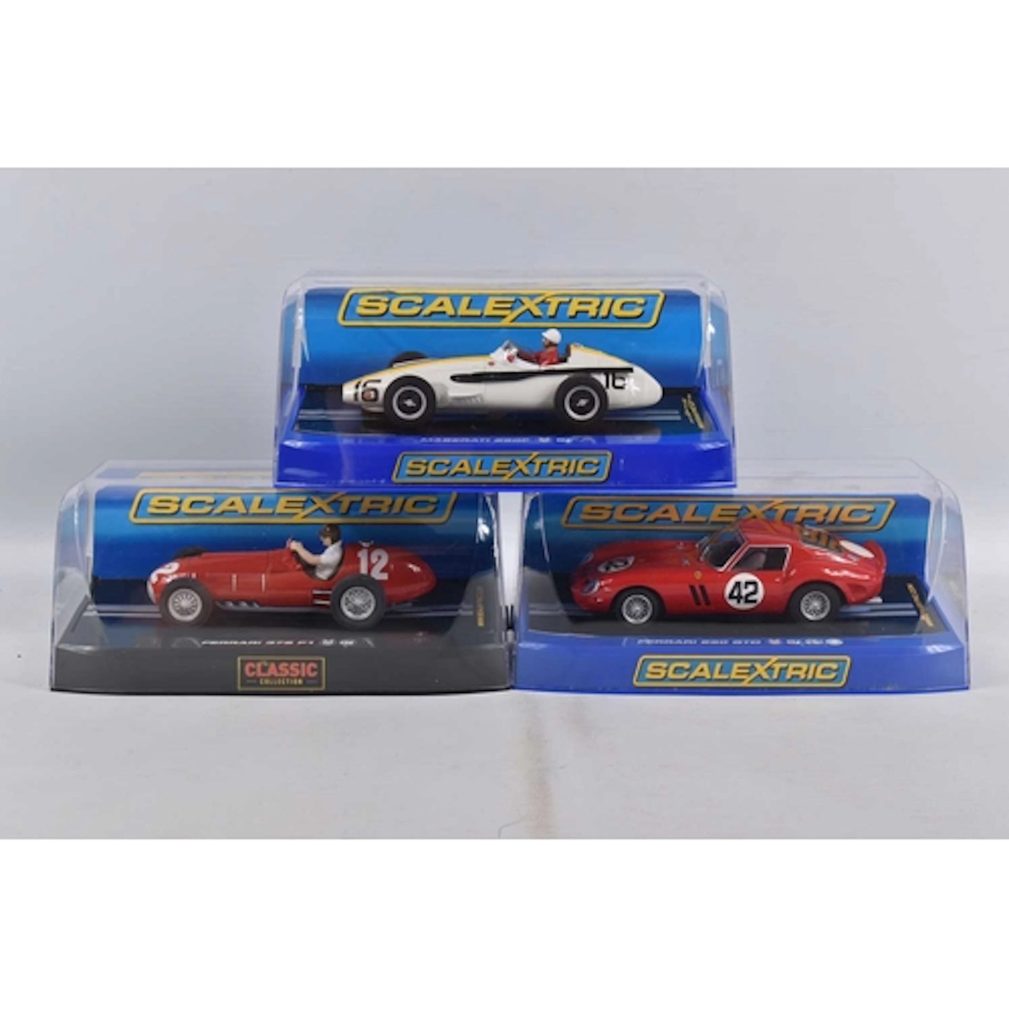 THREE CASED SCALEXTRIC 1:32 SCALE MODEL SLOT CARS, to includ...