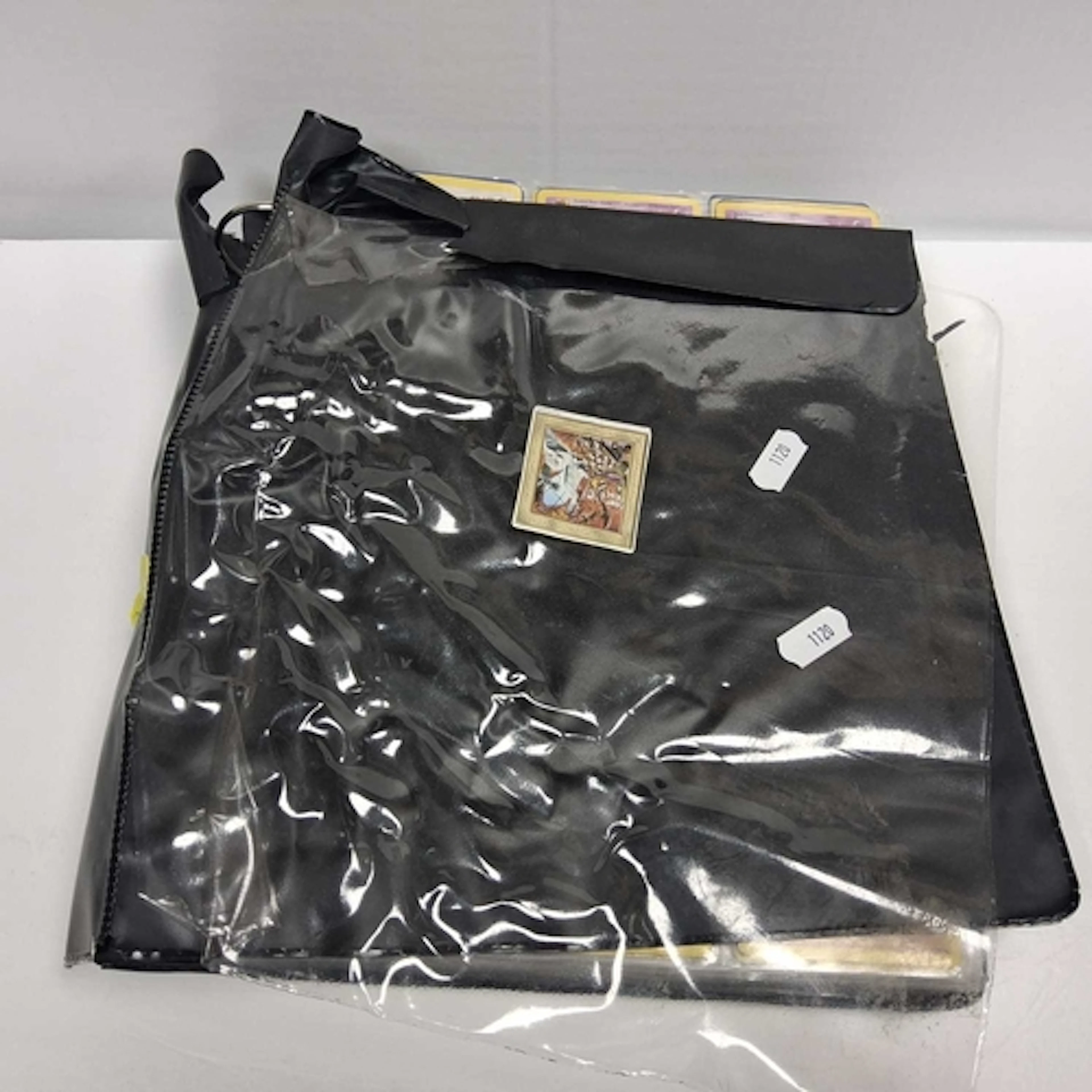 A FOLDER OF POKEMON CARDS, cards range from the Base Set, Ba...