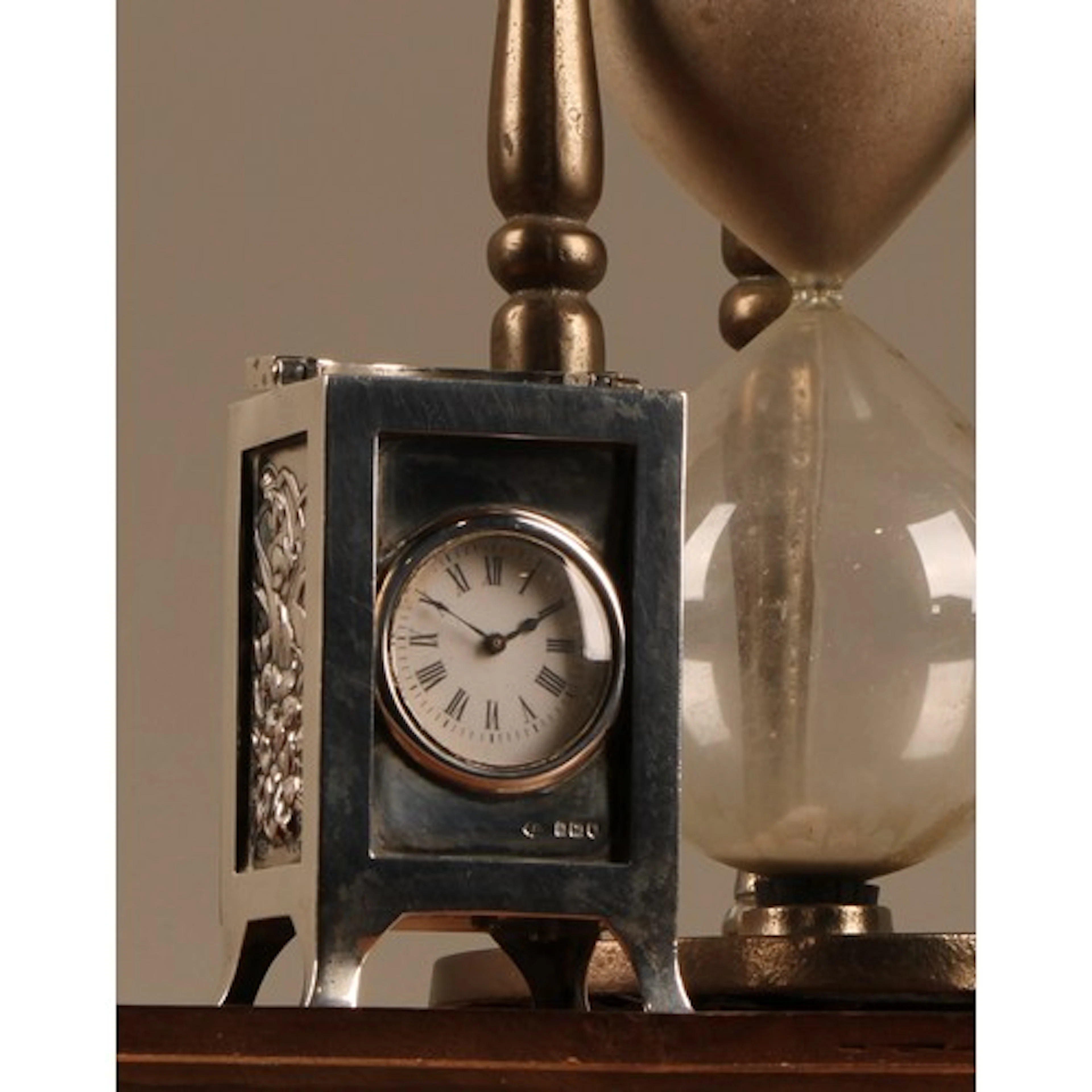 An Art Nouveau silver carriage timepiece, the 3cm clock dial...