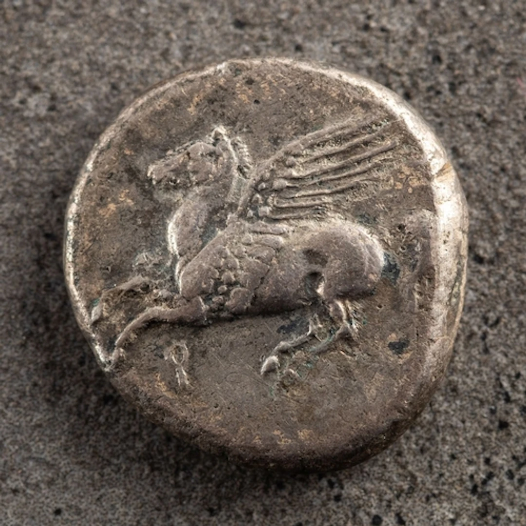An Ancient Greek Corinthian Stater coin. Having Peguses to t...