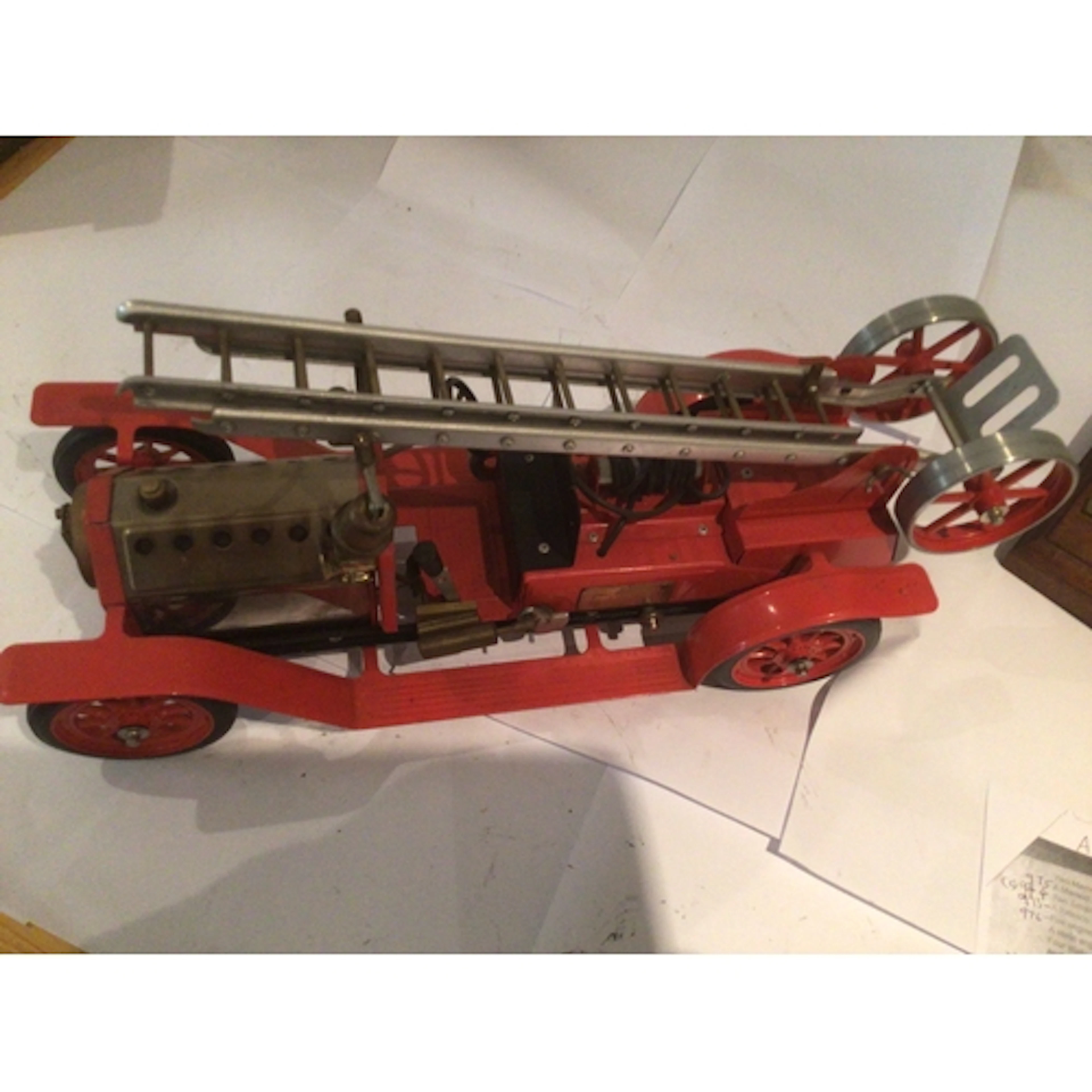 A model steam powered vintage fire engine by Mamod, named ST...