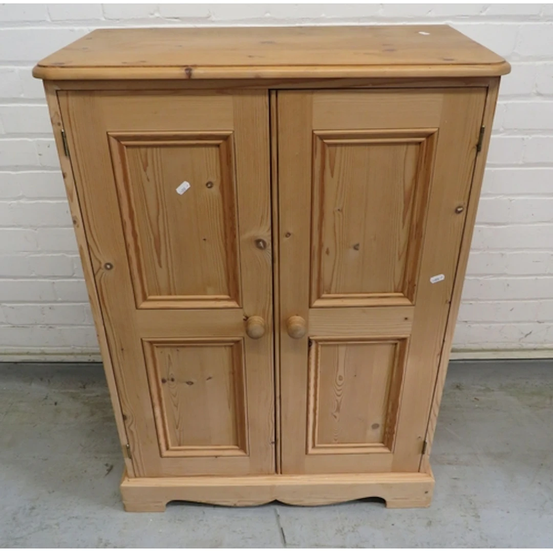 Pine Cupboard, 2 carved doors, bun handles, bracket supports...
