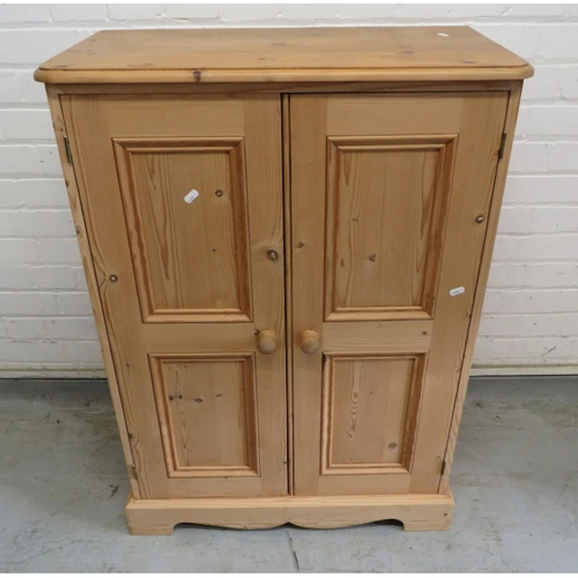 Pine Cupboard, 2 carved doors, bun handles, bracket supports...