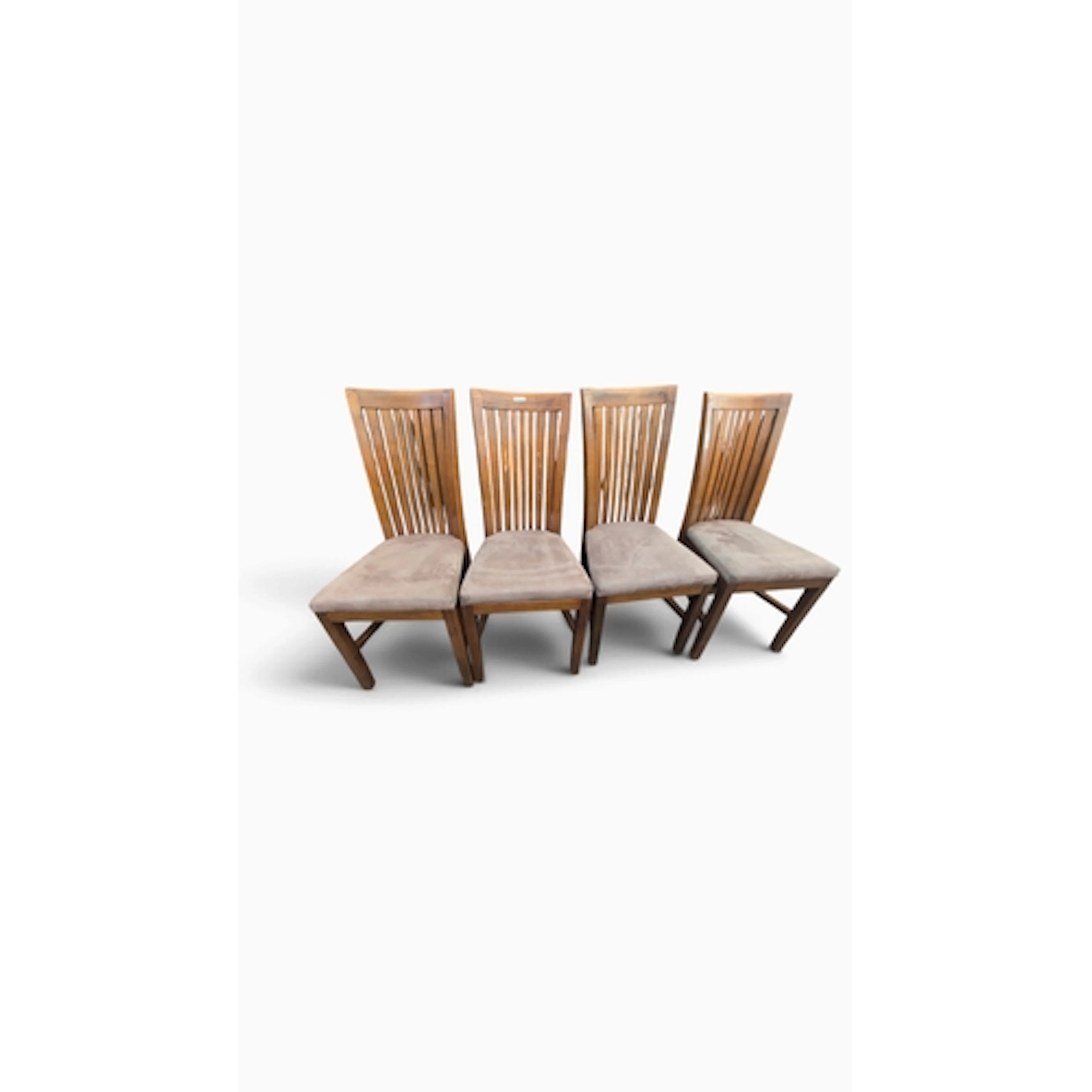 A set of four oak dining chairs with tall vertical slat back...