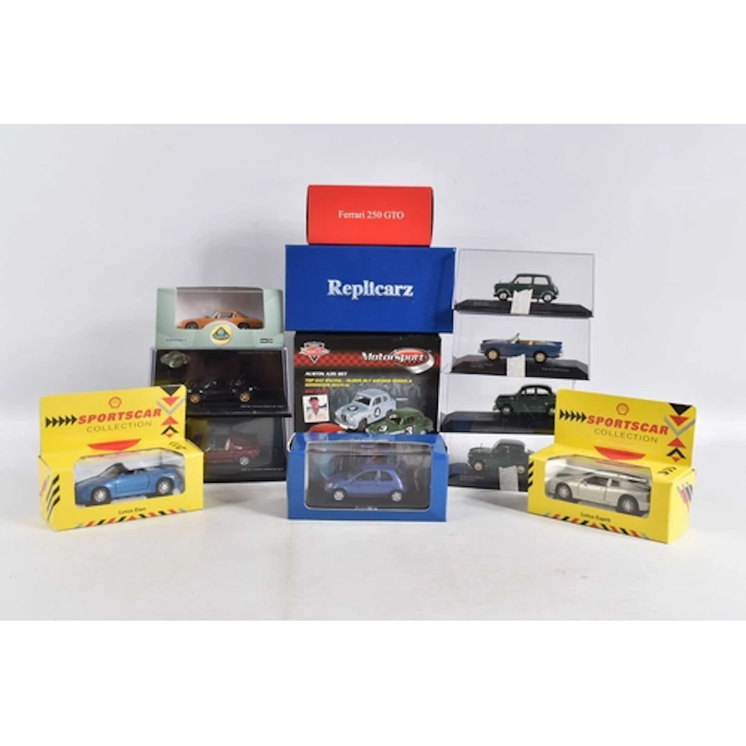 THIRTEEN BOXED OR CASED 1:43 SCALE MODEL VEHICLES, to includ...