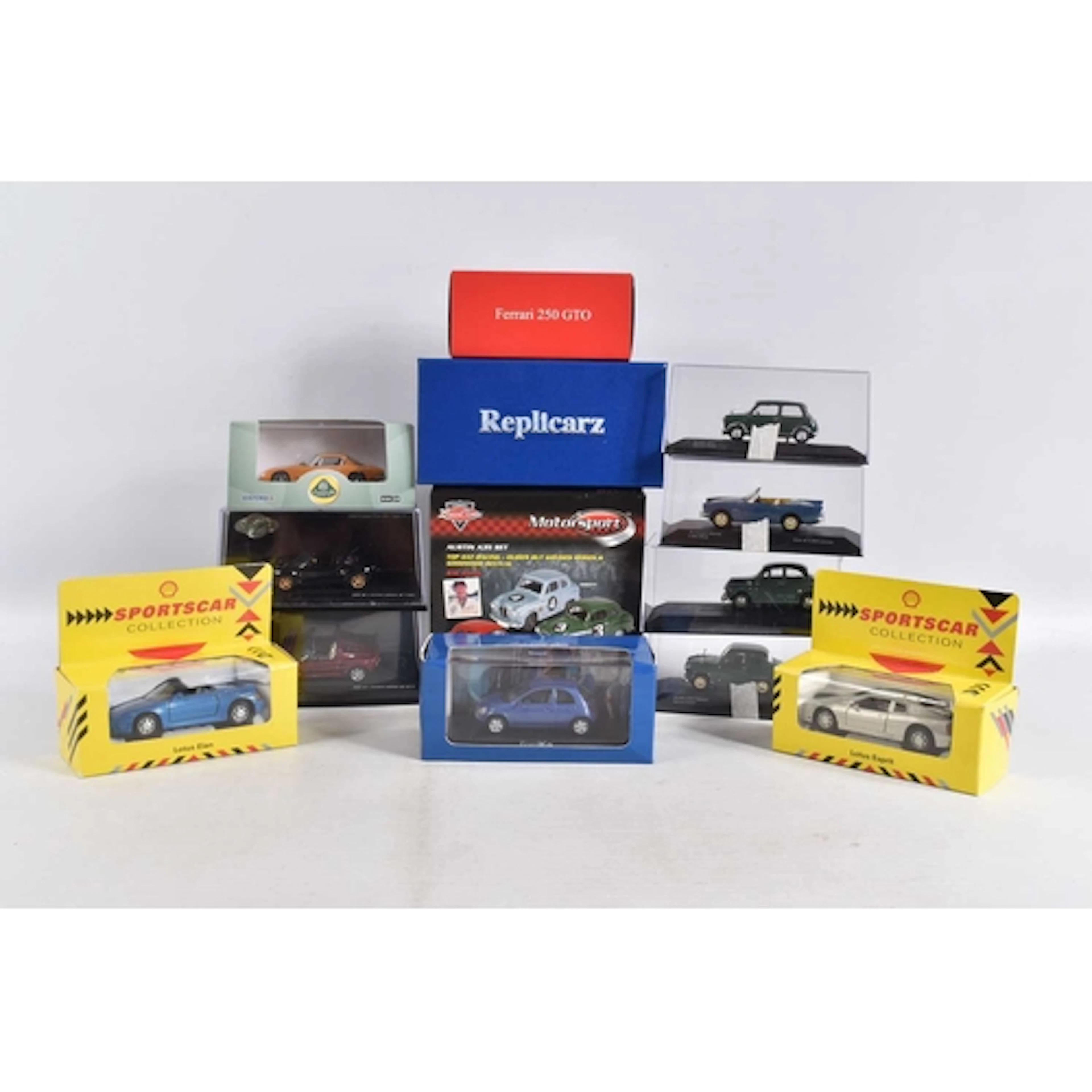 THIRTEEN BOXED OR CASED 1:43 SCALE MODEL VEHICLES, to includ...