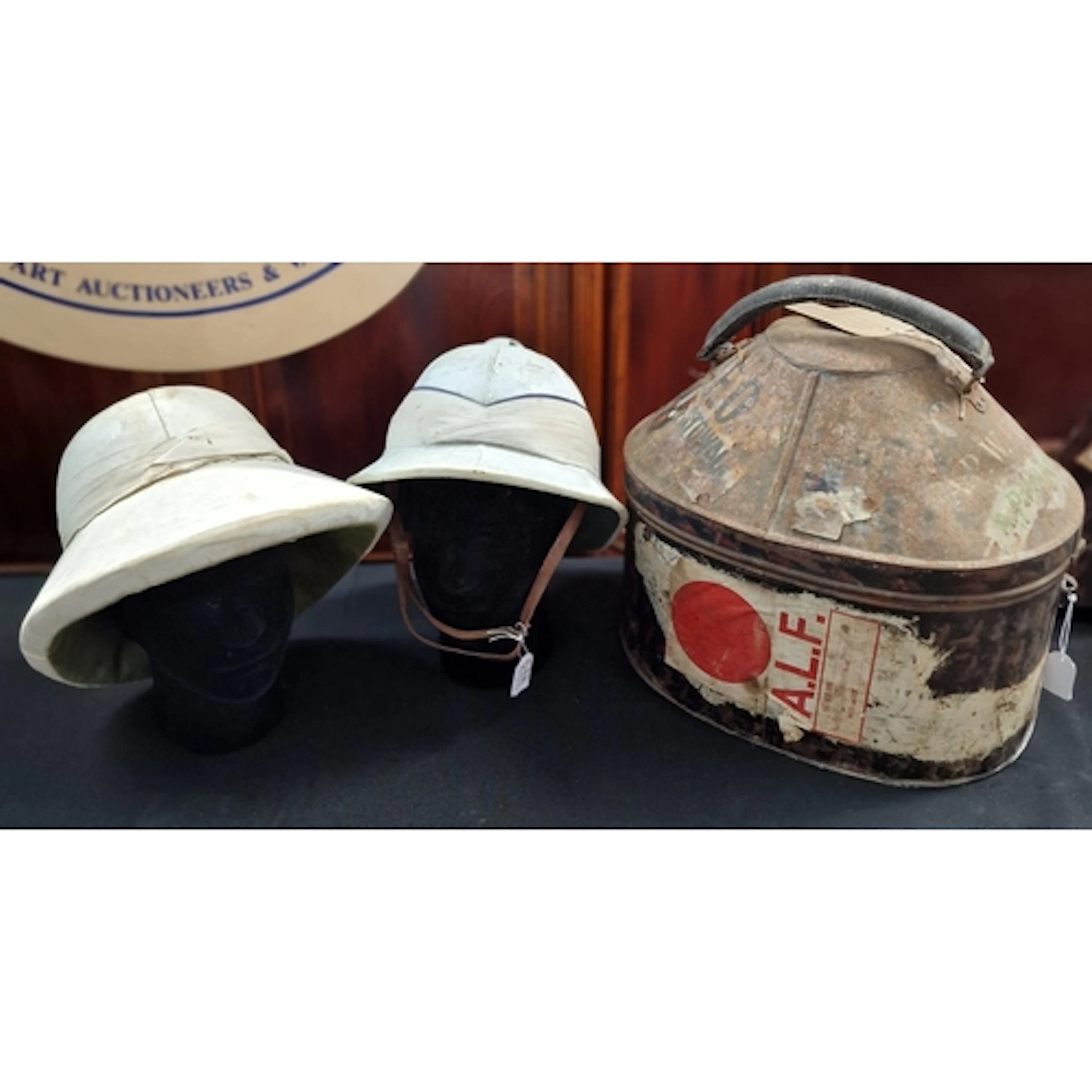 Two pith helmets, comprising a Townsend’s, London example ma...
