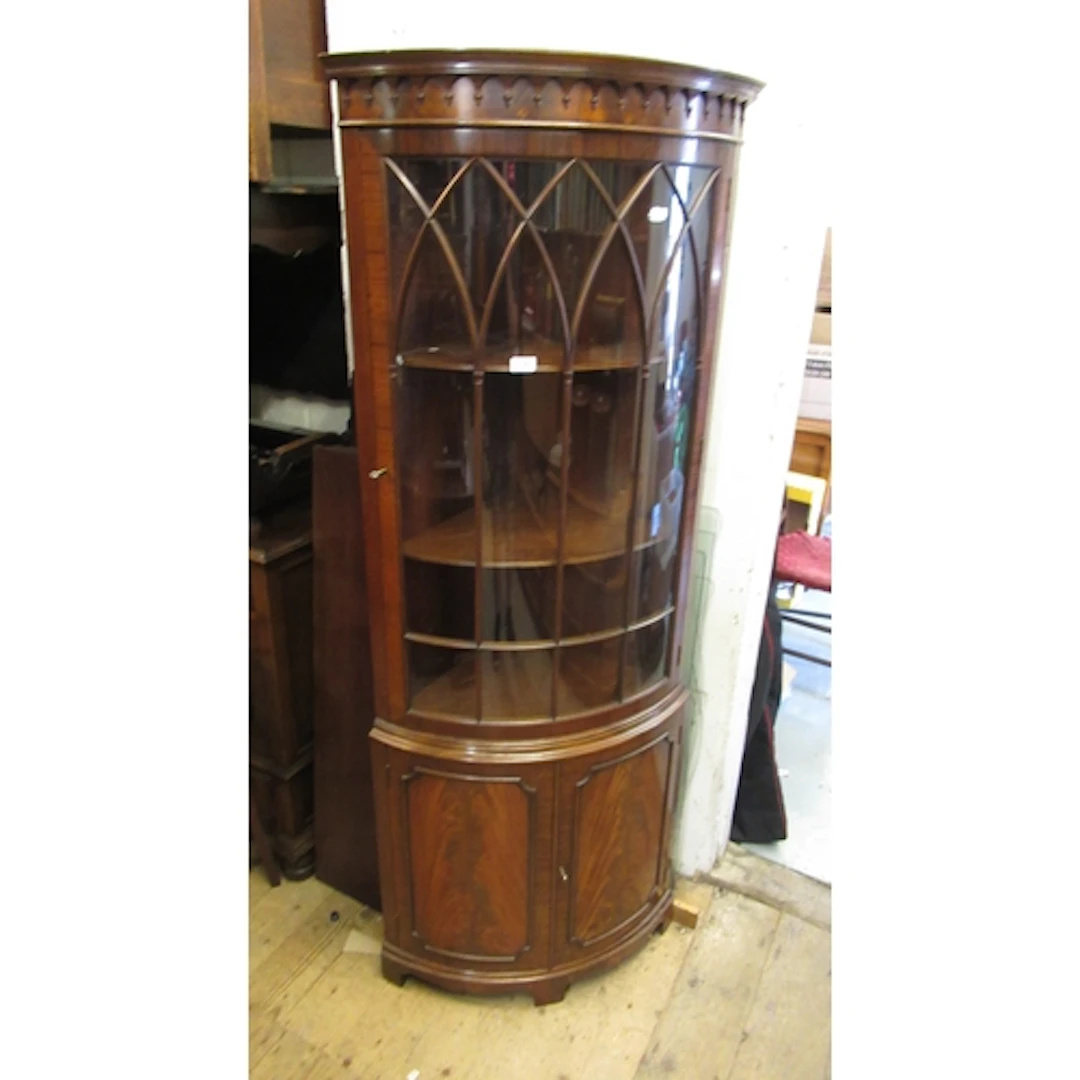 George III style mahogany bow front standing corner cupboard...