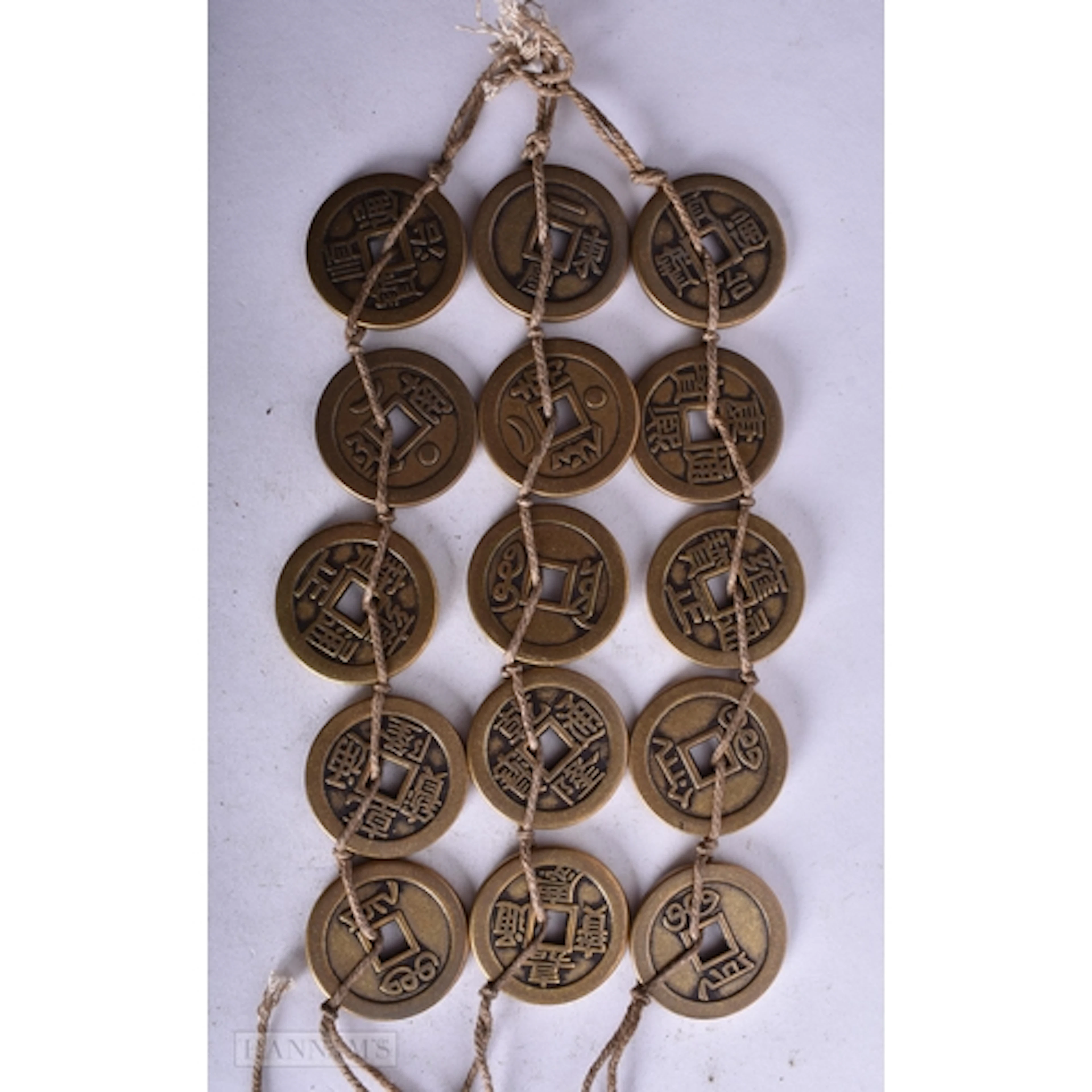 A QUANTITY OF CHINESE COINS. 3.2 cm diameter