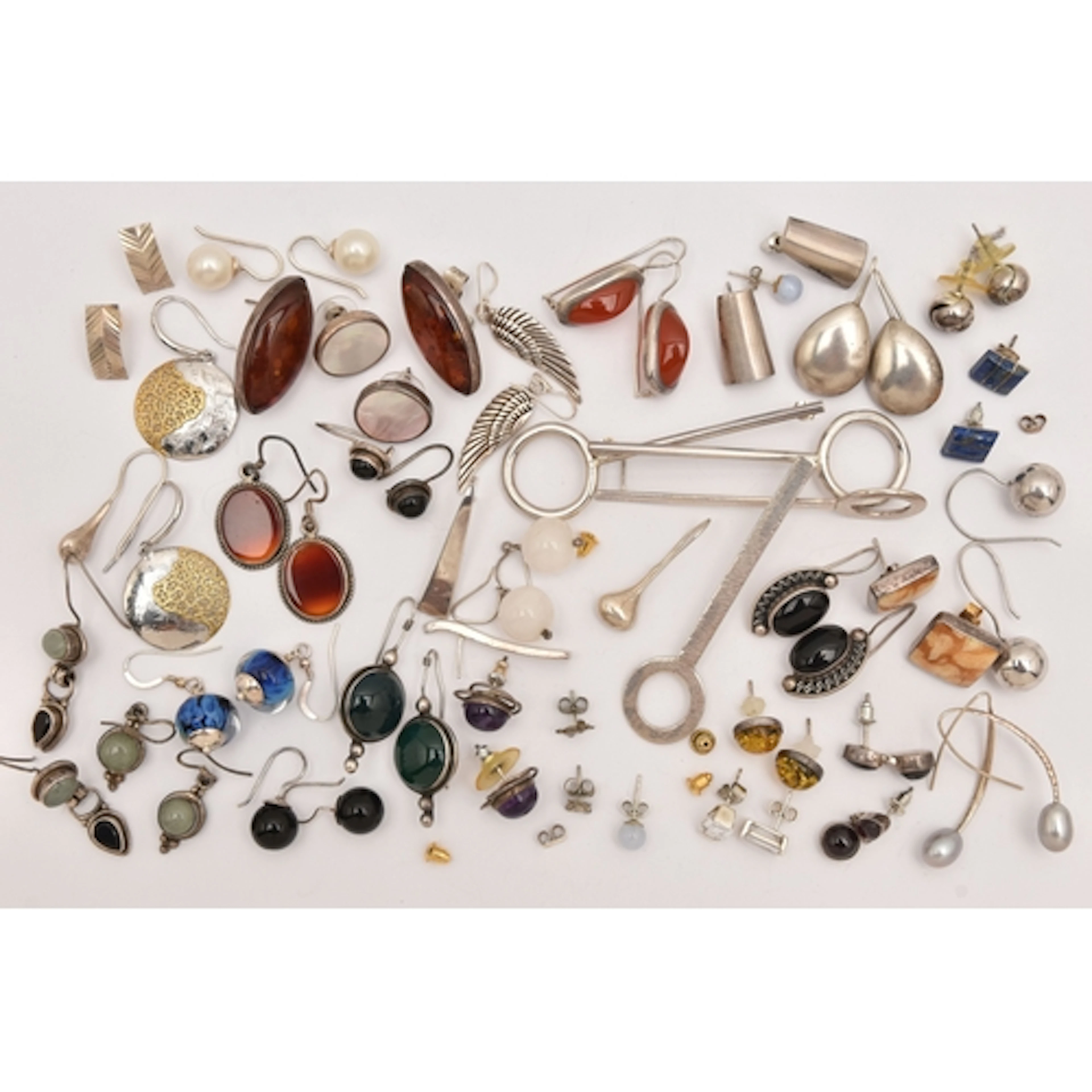 AN ASSORTMENT OF WHITE METAL EARRINGS, to include a pair of ...