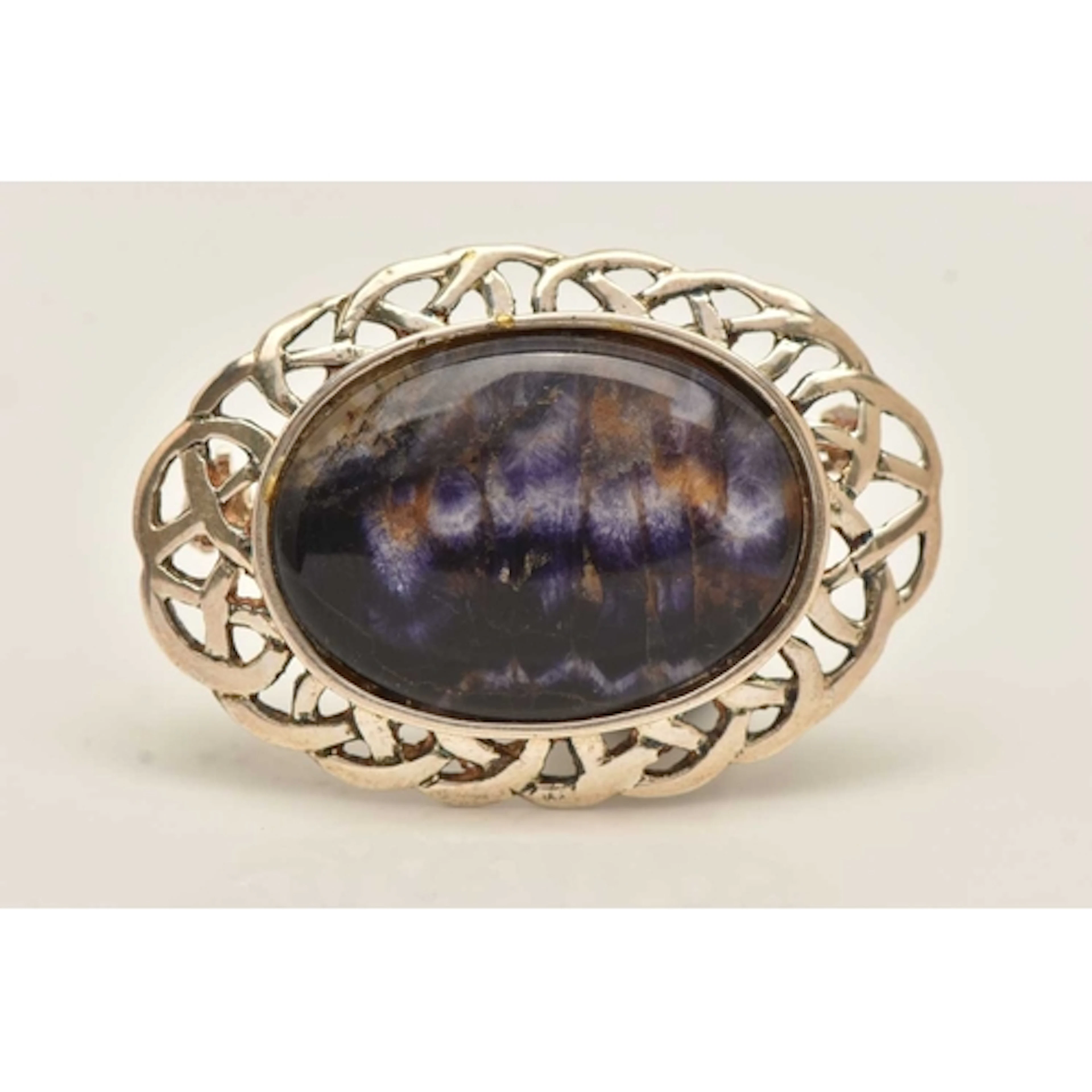 A BLUE JOHN DOUBLET BROOCH, an oval Blue John doublet, set i...