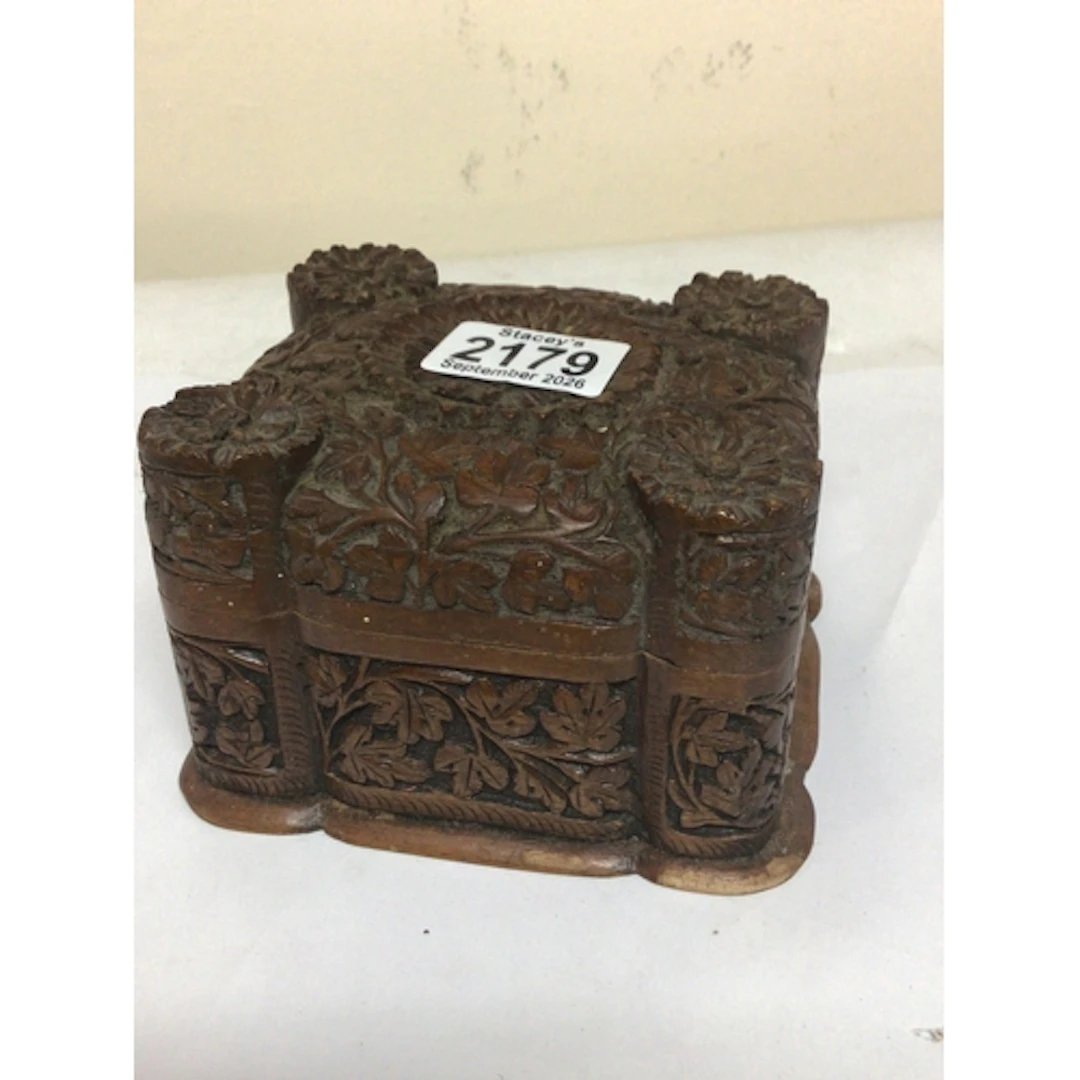 A carved hardwood cigarette box NO RESERVE.