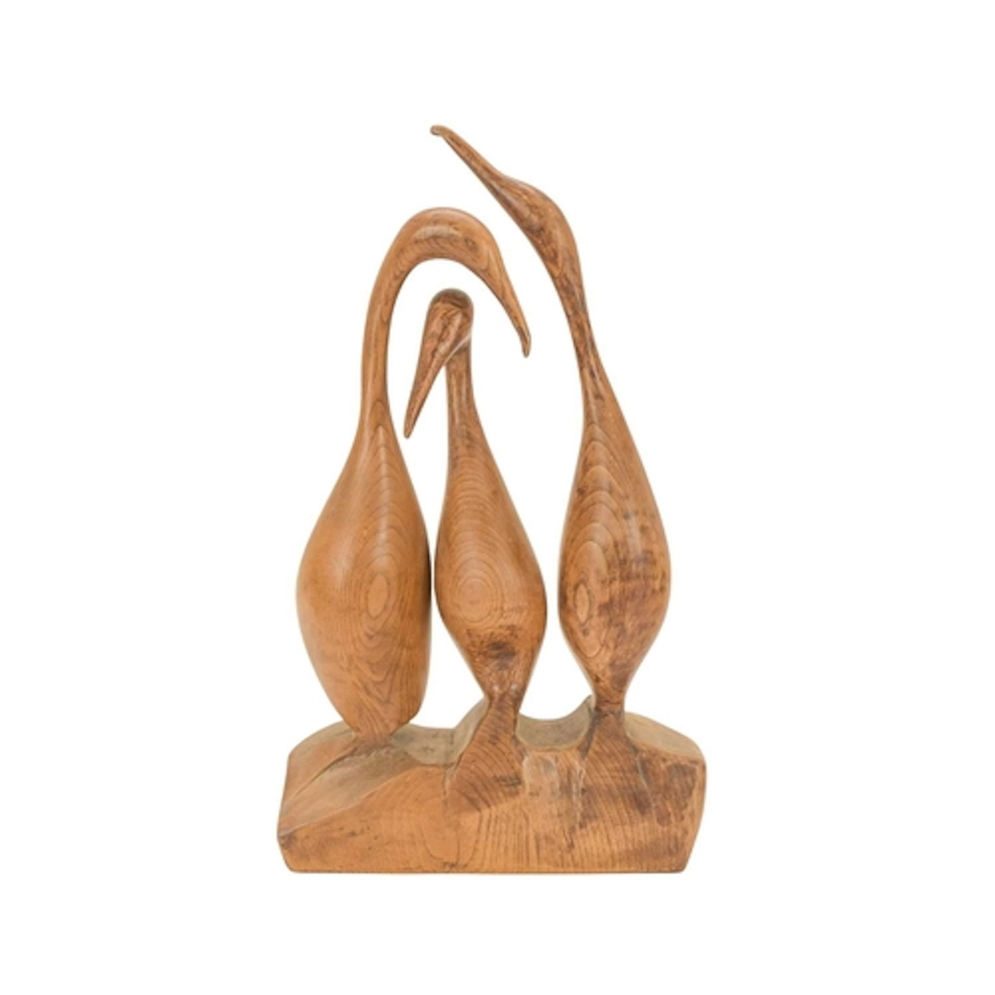A carved elm bird group sculpture. By Brian and Rachel Hanco...