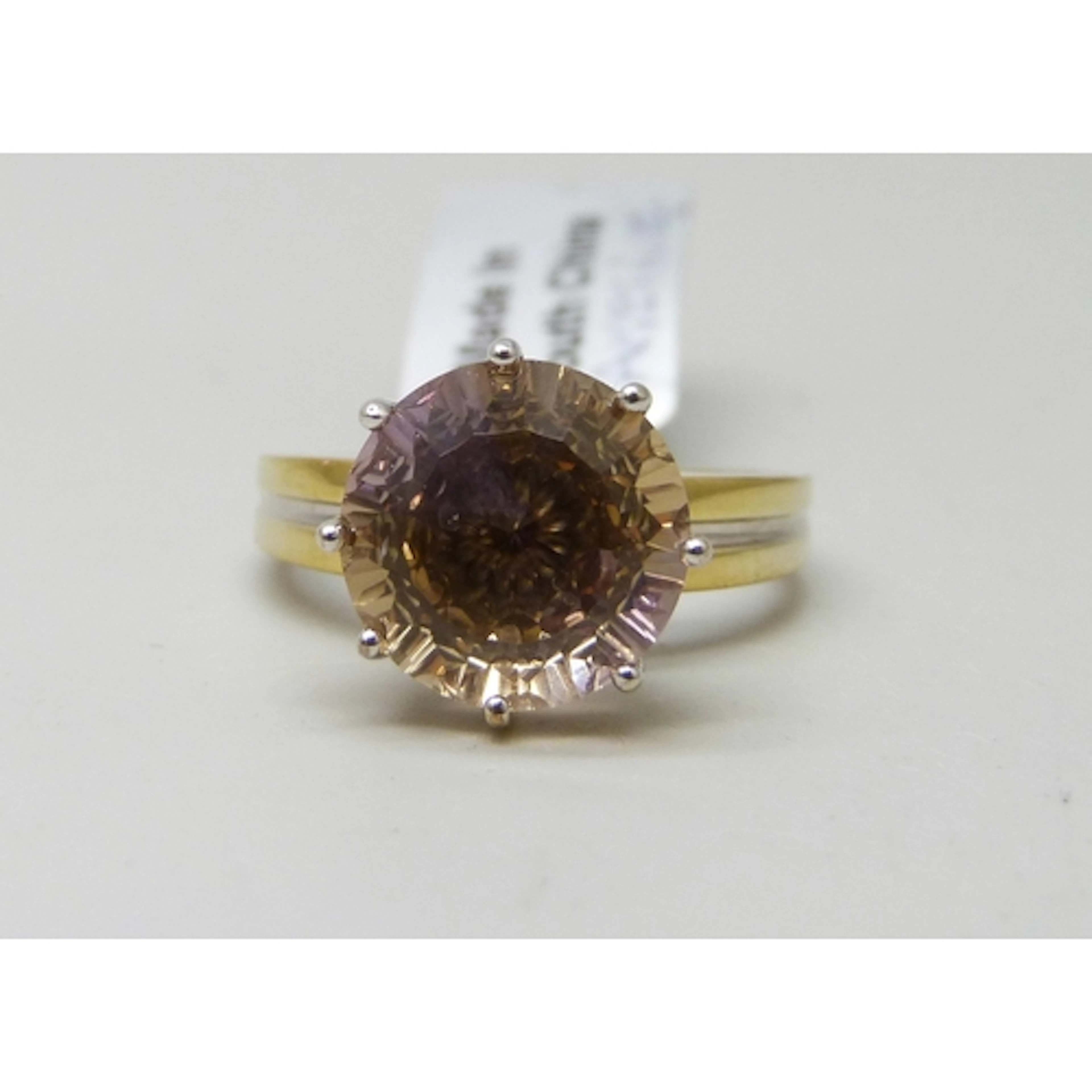 A silver gilt ametrine ring, plating worn, R/S