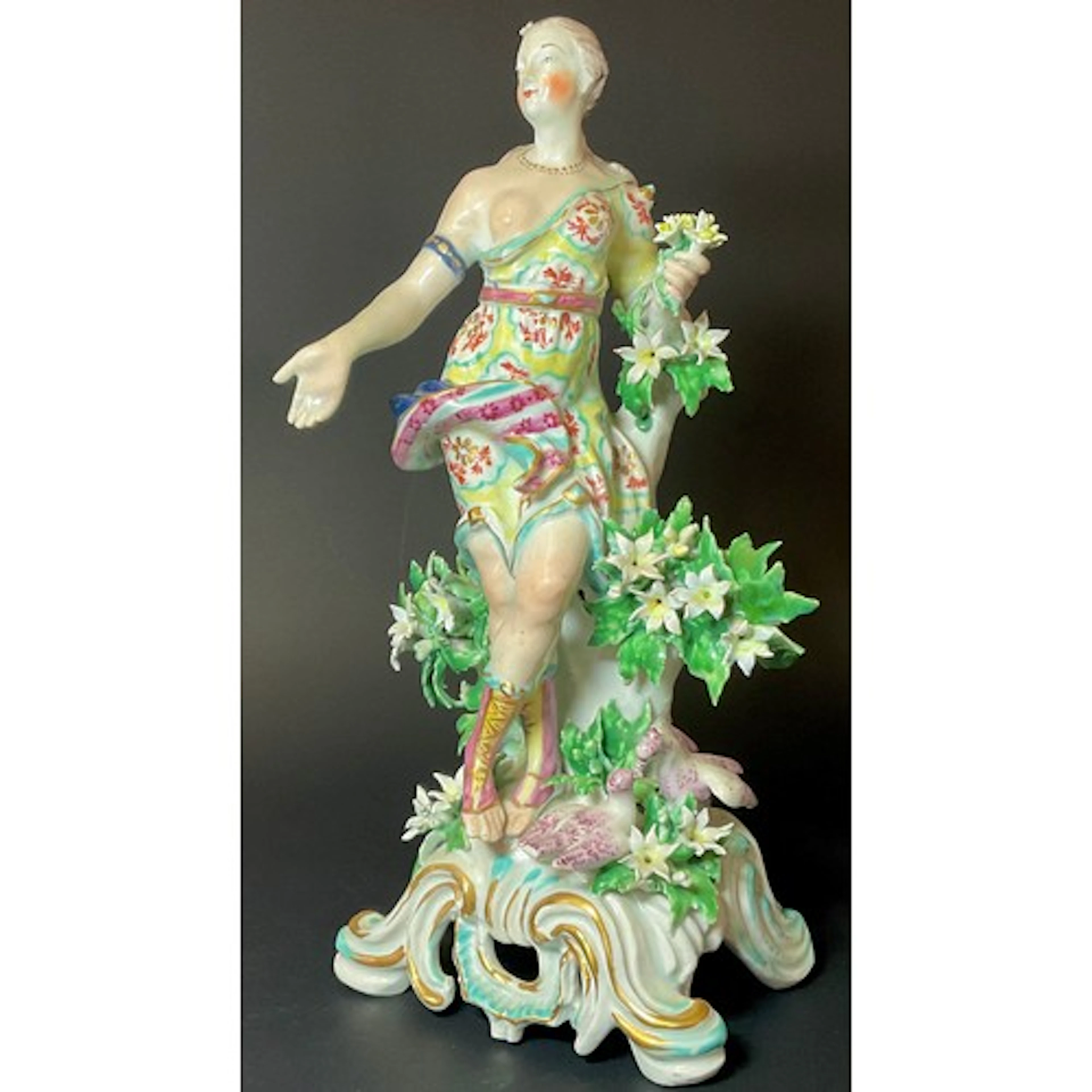 An Bow figure, of Venus, she stands wearing loose dress and ...