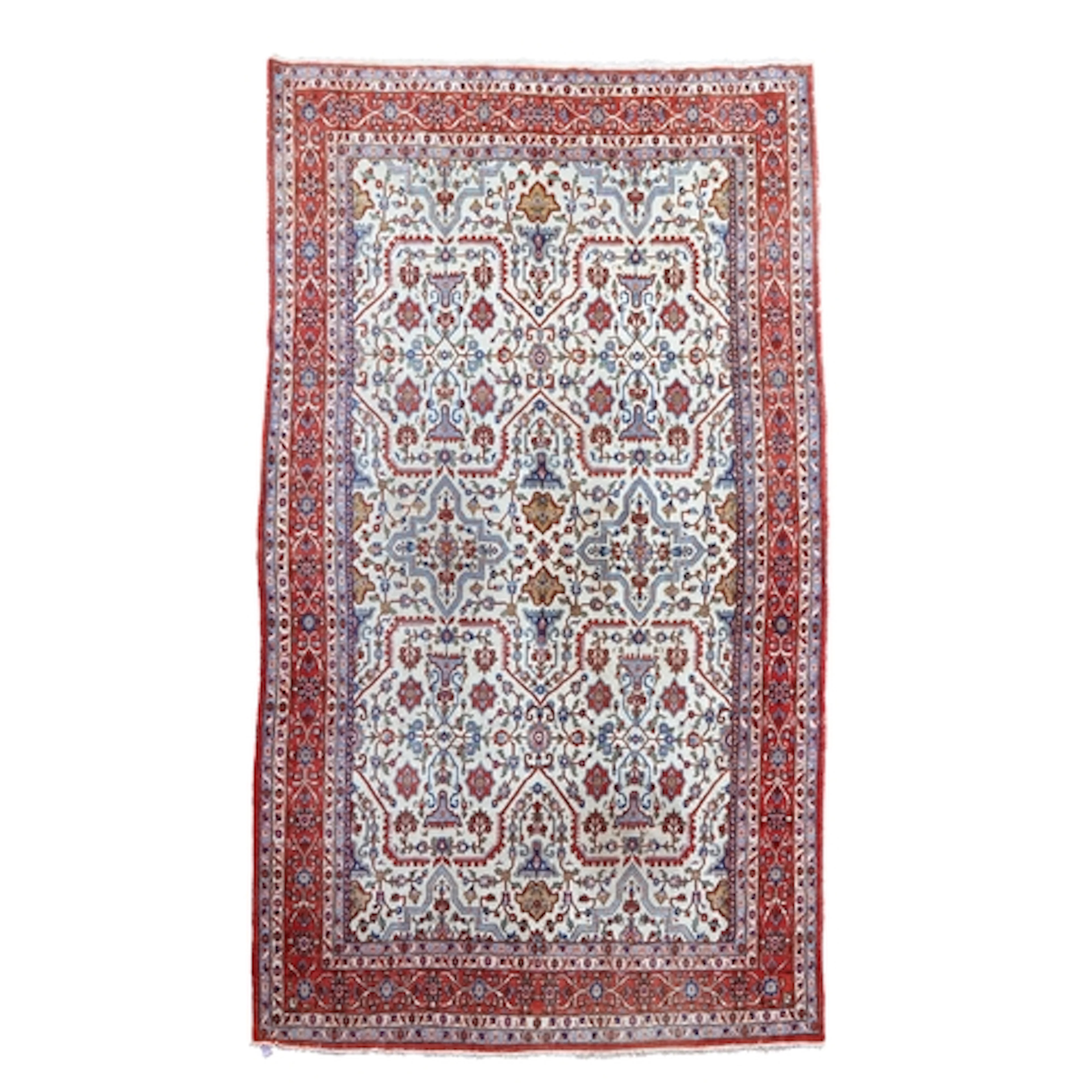 A Sarouk ivory ground carpet, the dense floral field within ...