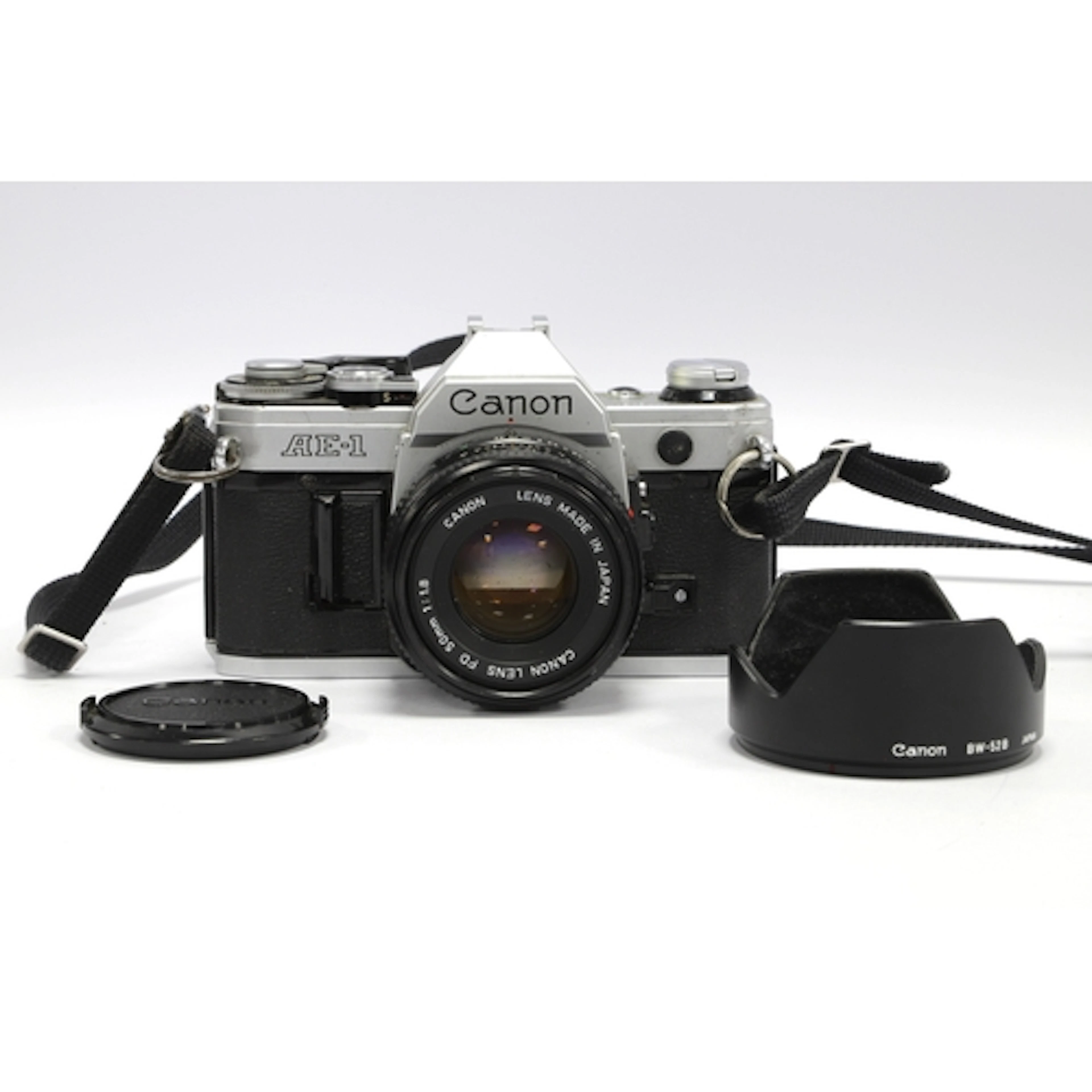 Canon AE-1 35mm SLR Film Camera with attached Canon FD 50mm ...