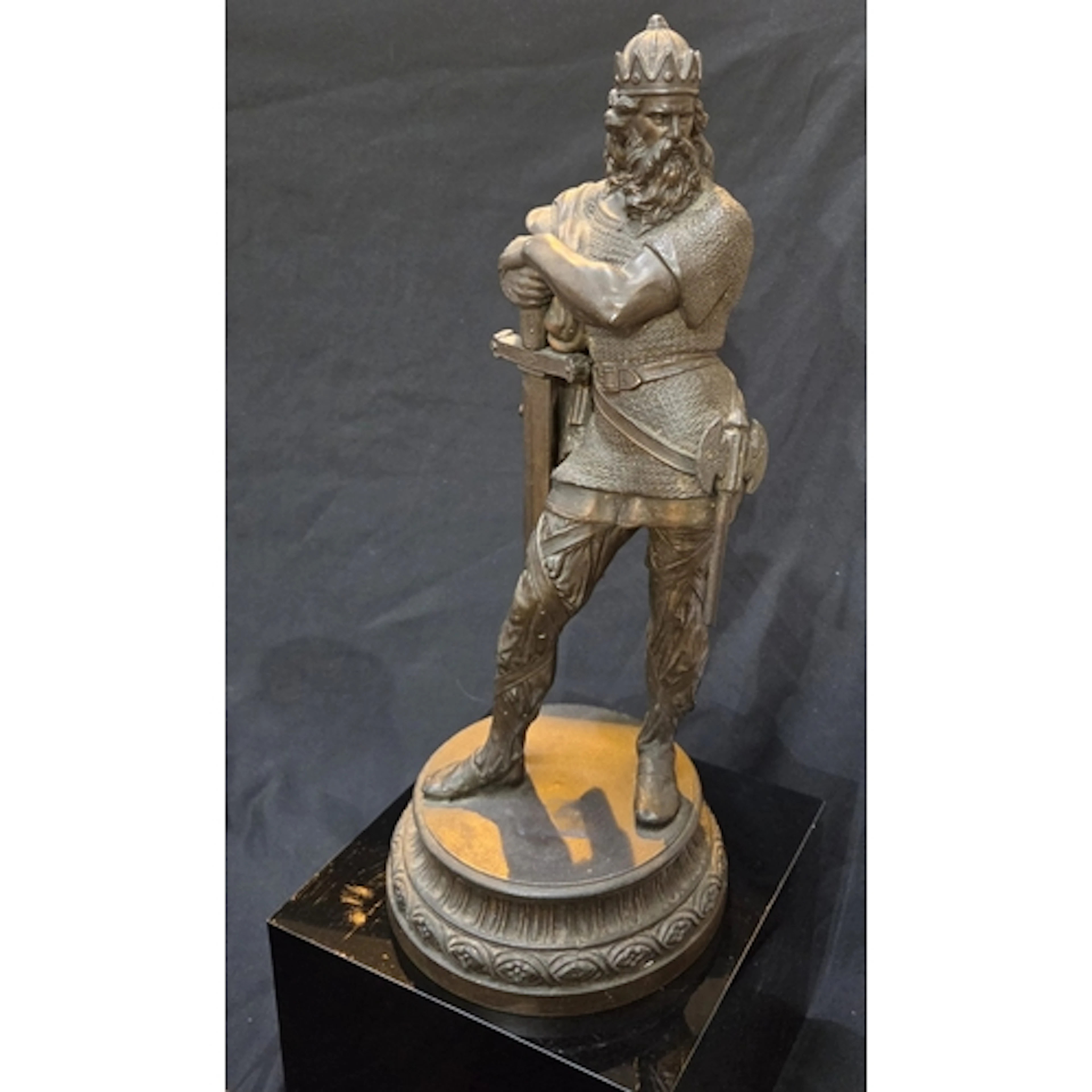 A Late 19th/ early 20th century patinated bronze figural scu...