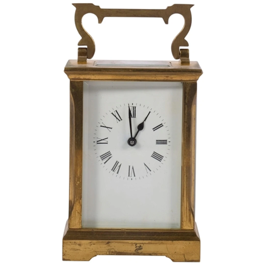 A brass-cased carriage clock, enamel dial, height not includ...