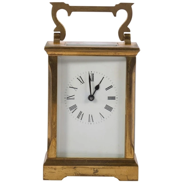 A brass-cased carriage clock, enamel dial, height not includ...