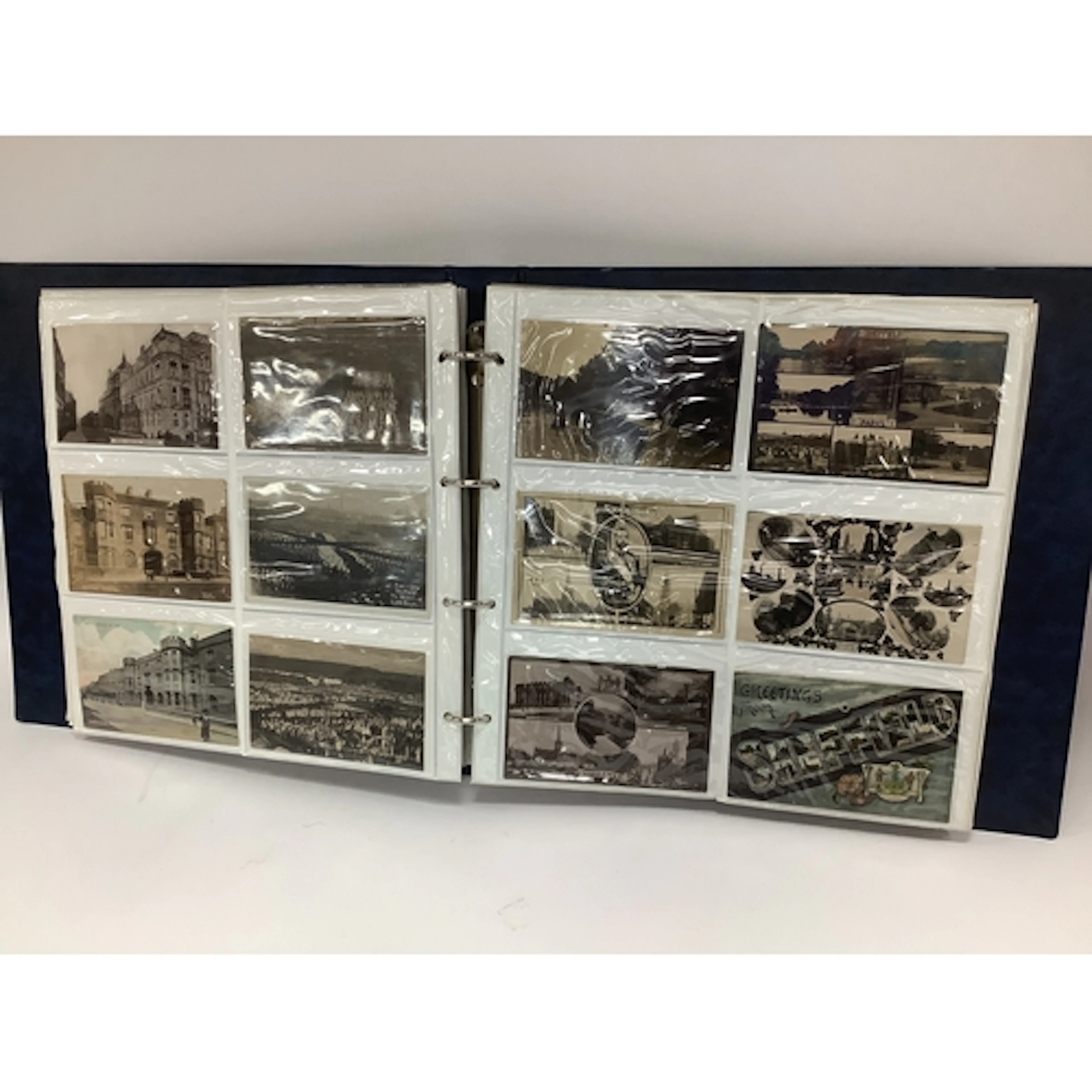 An Album of Early XX Century Picture Postcards, (approximate...