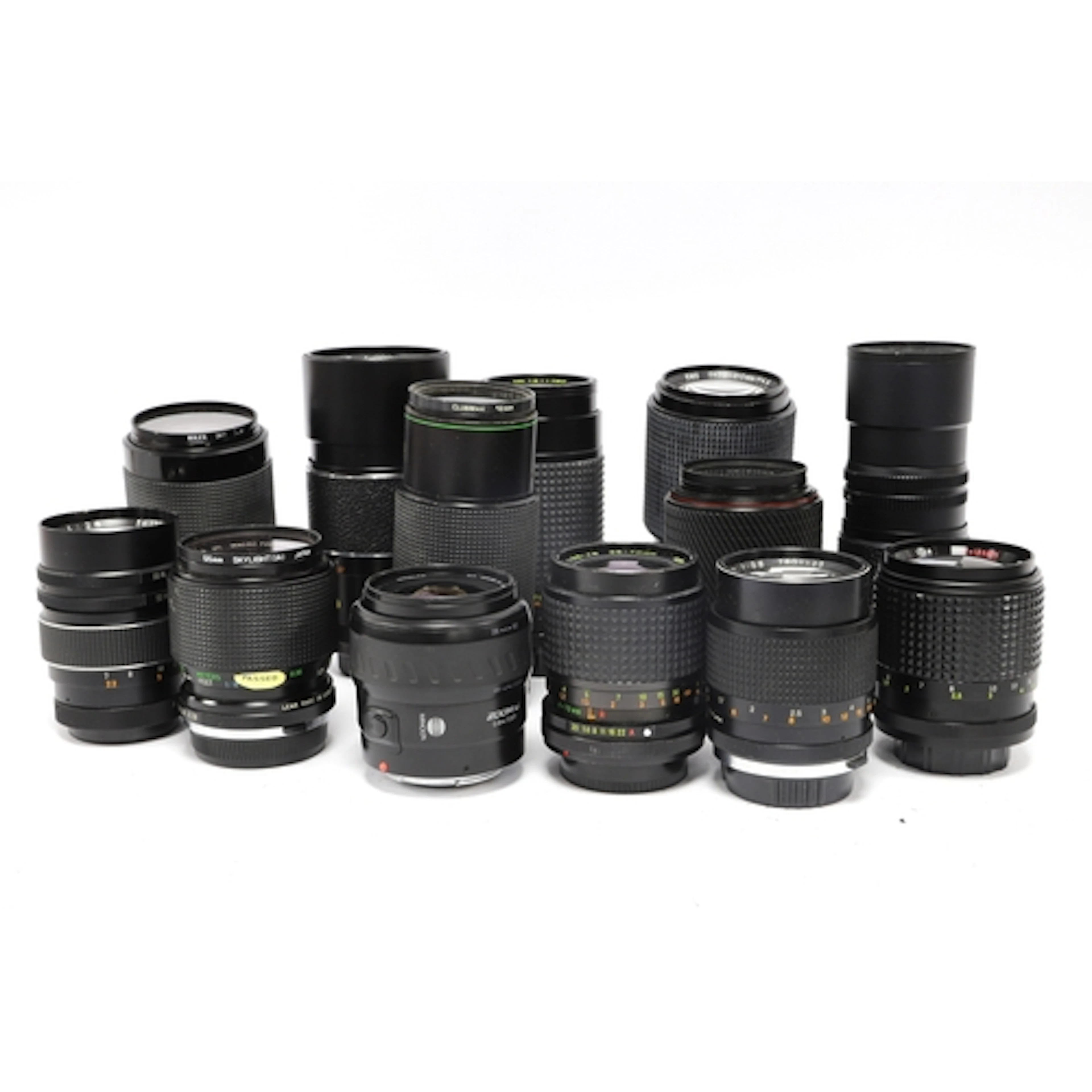 A collection of Zoom Lenses to include Tokina II 70-210mm f/...