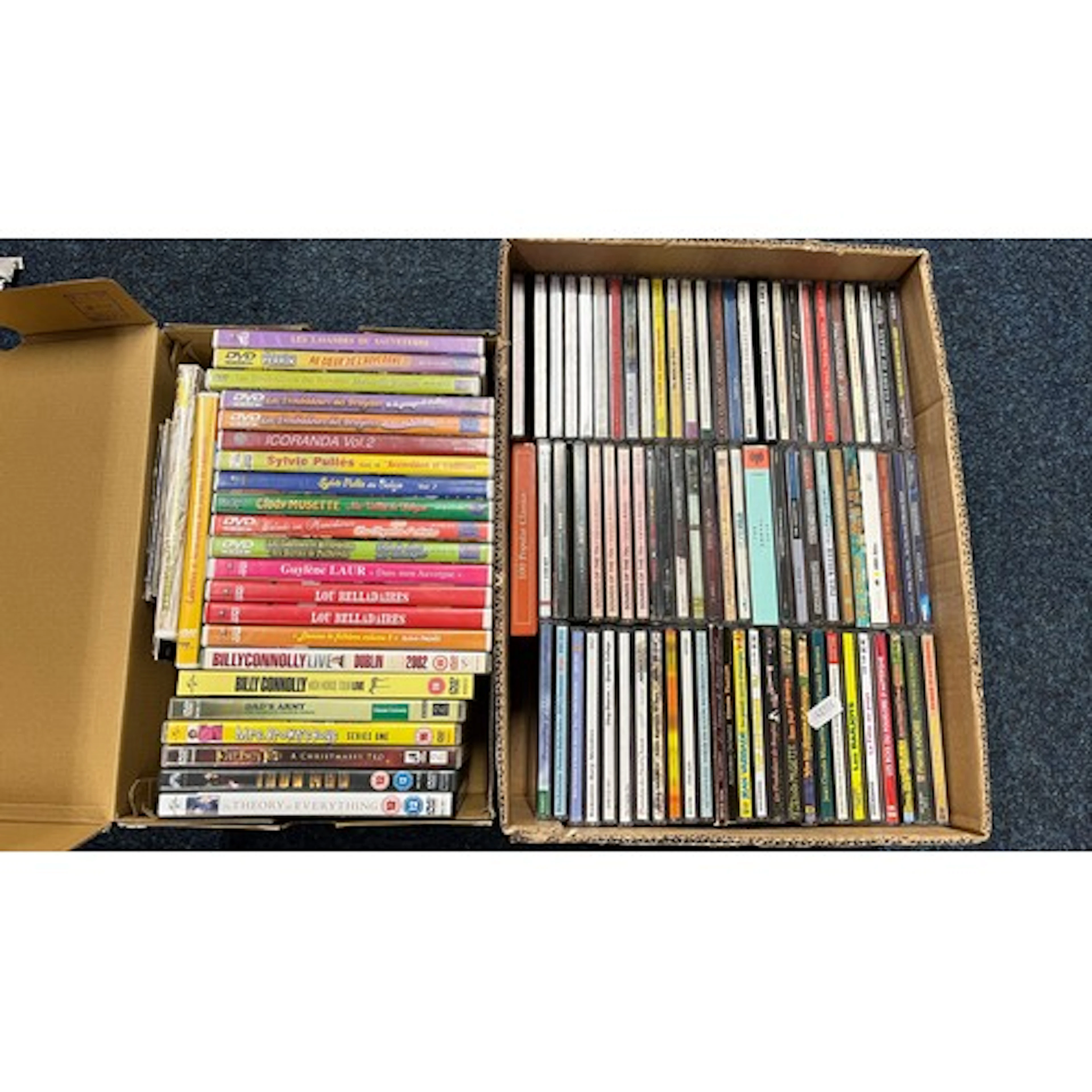 Box of DVD's and a box of CD's