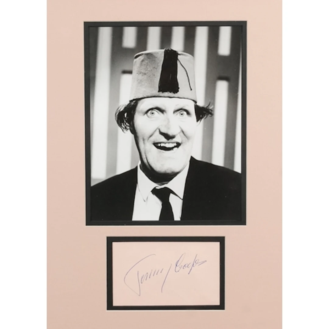 Tommy Cooper photograph with signature, 44cm x 34cm includin...