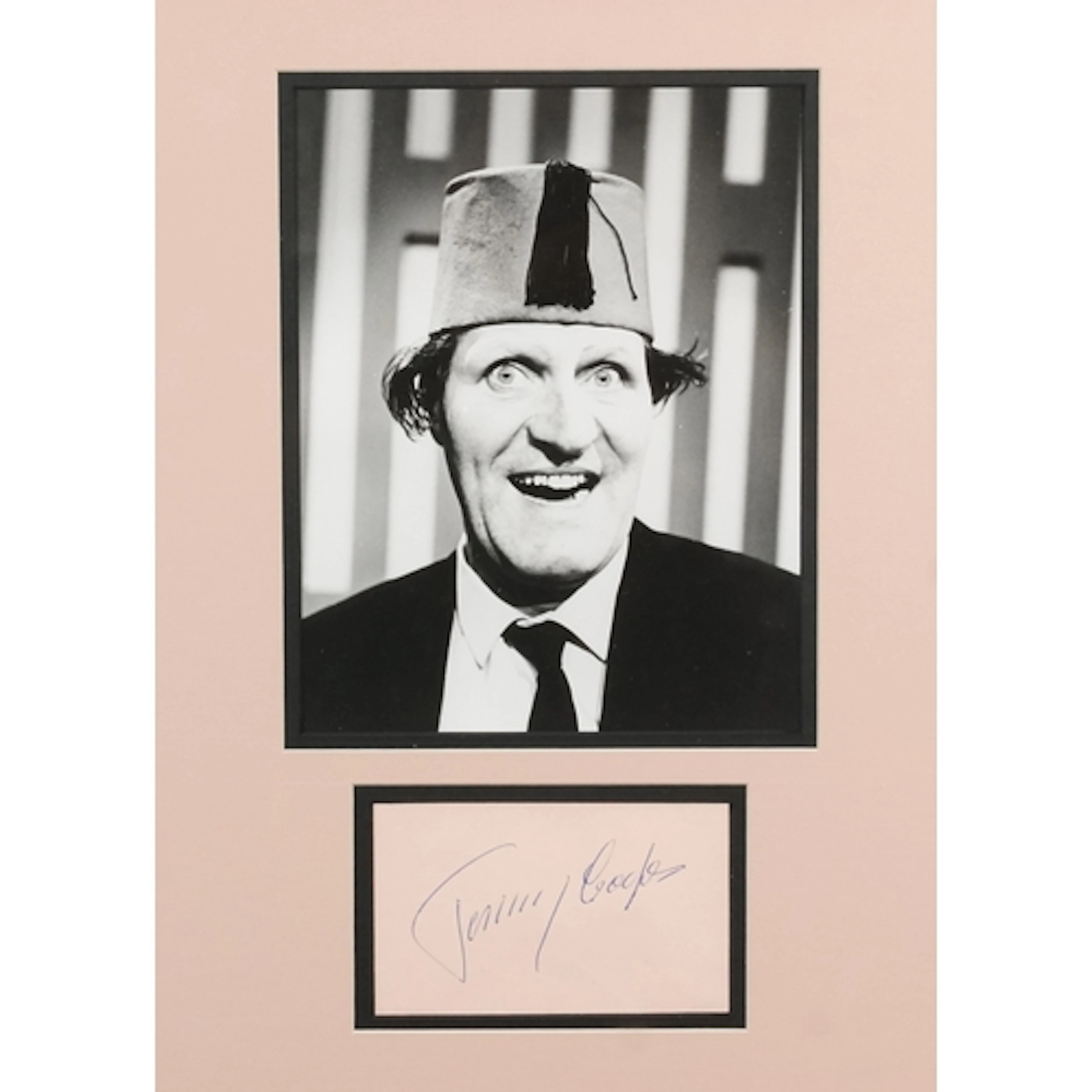 Tommy Cooper photograph with signature, 44cm x 34cm includin...