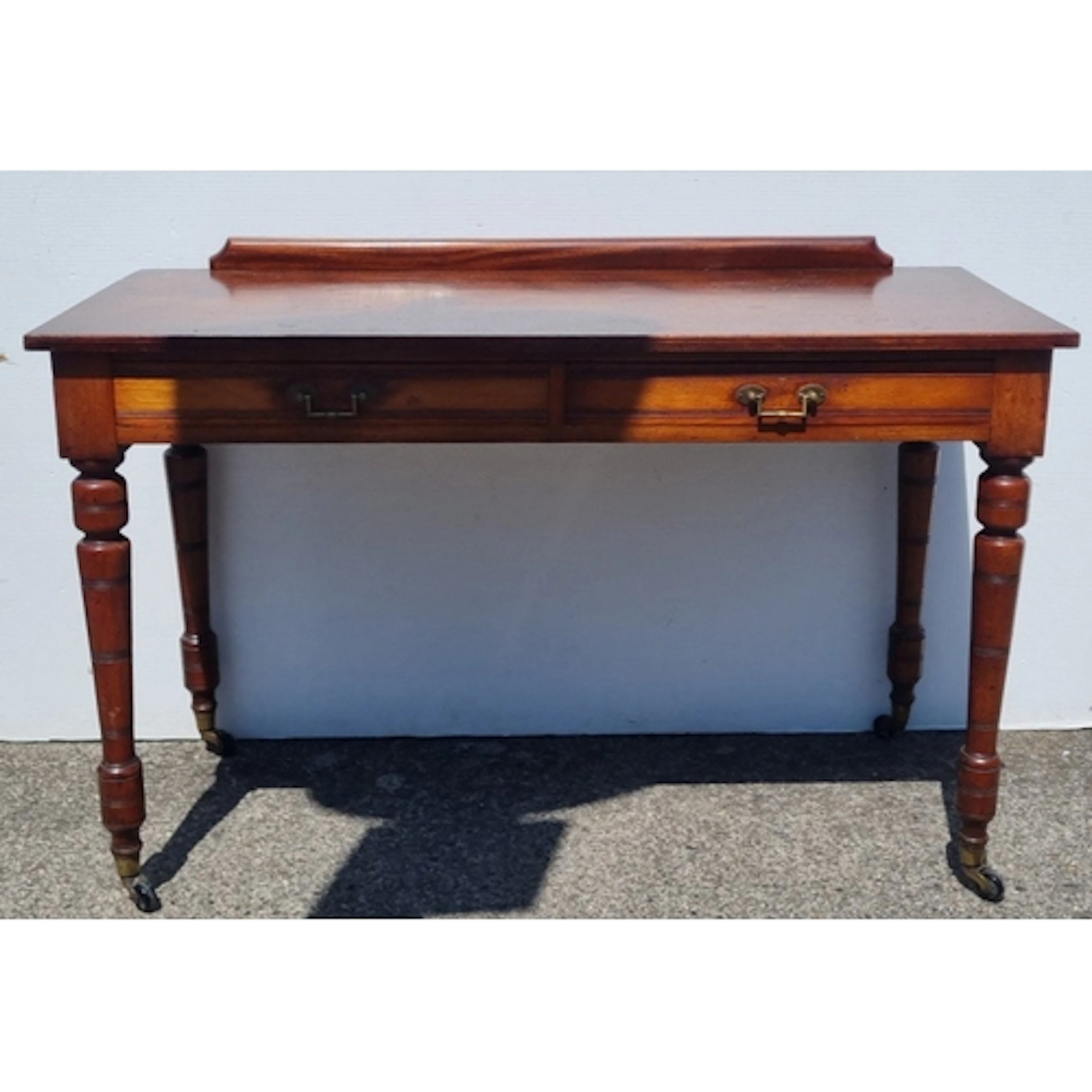 Antique Mahogany writing or side table with raised back, two...