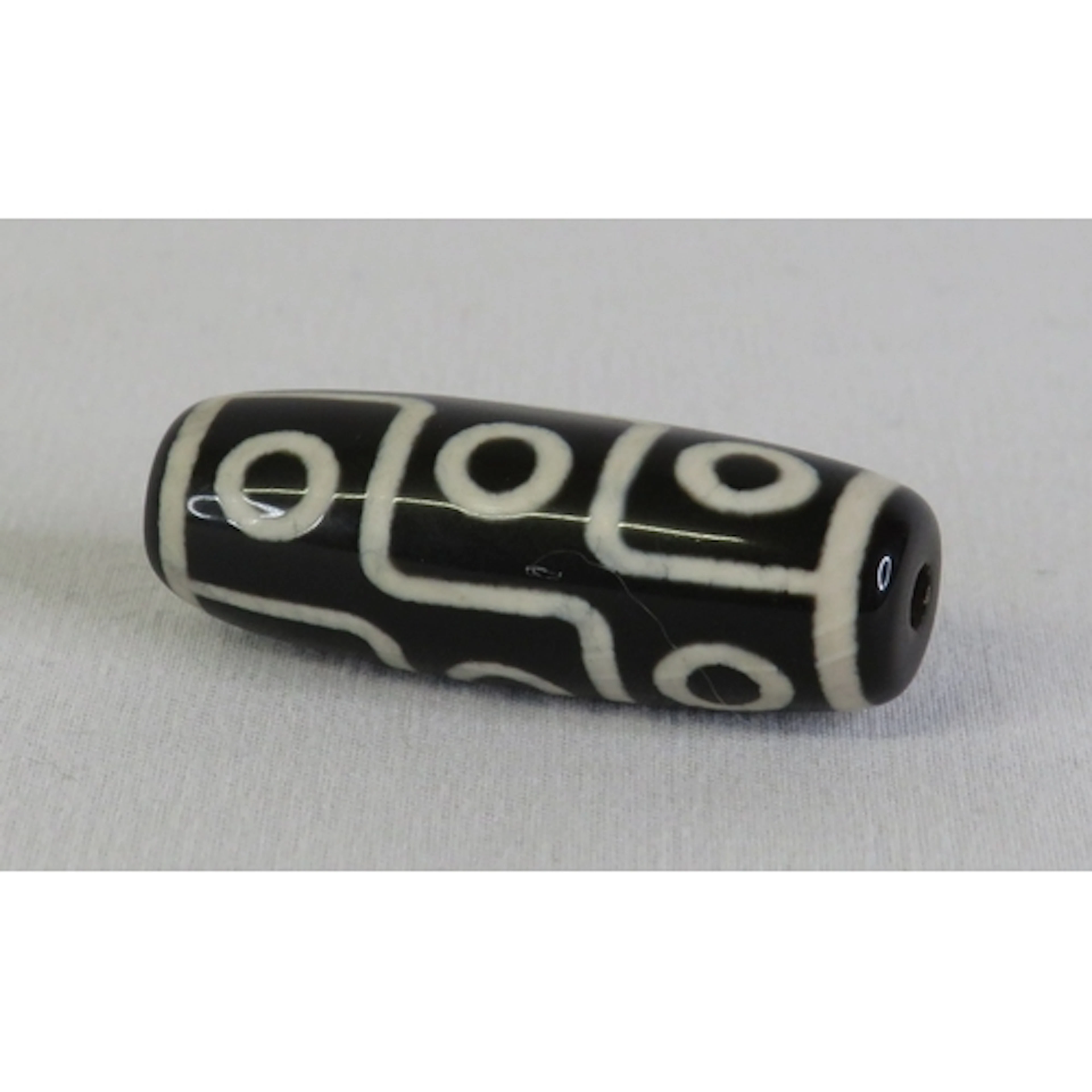 Tibetan Dzi Bead, approx. 4cm L