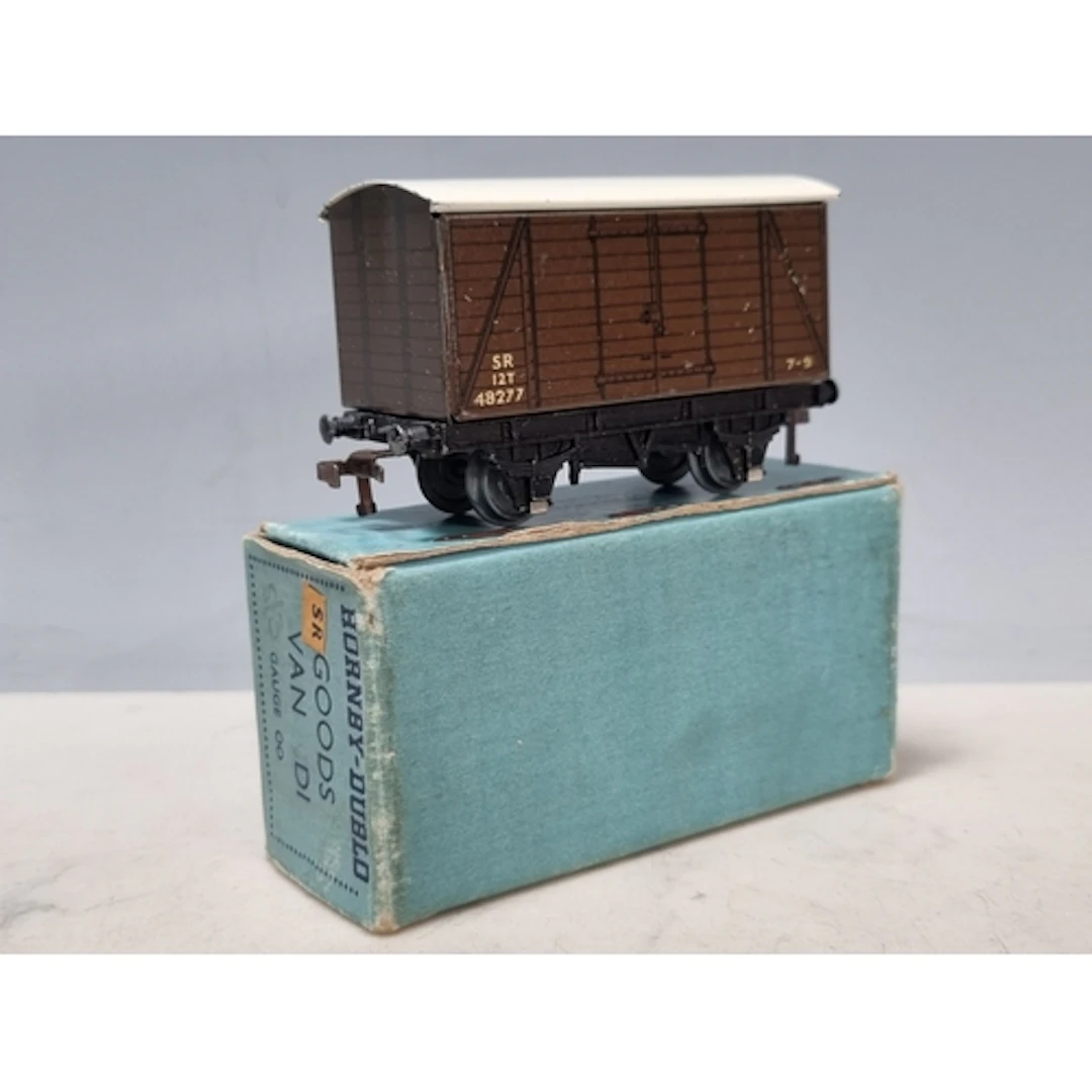 A boxed Hornby Dublo D1 SR Goods Van, Ex, box 9/48 Ex plus w...