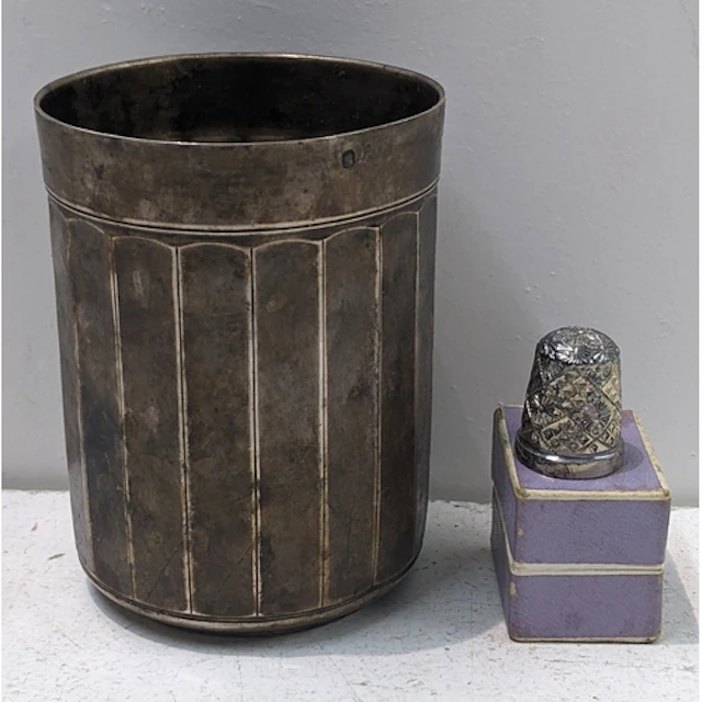 An early 20th century French silver beaker together with a b...