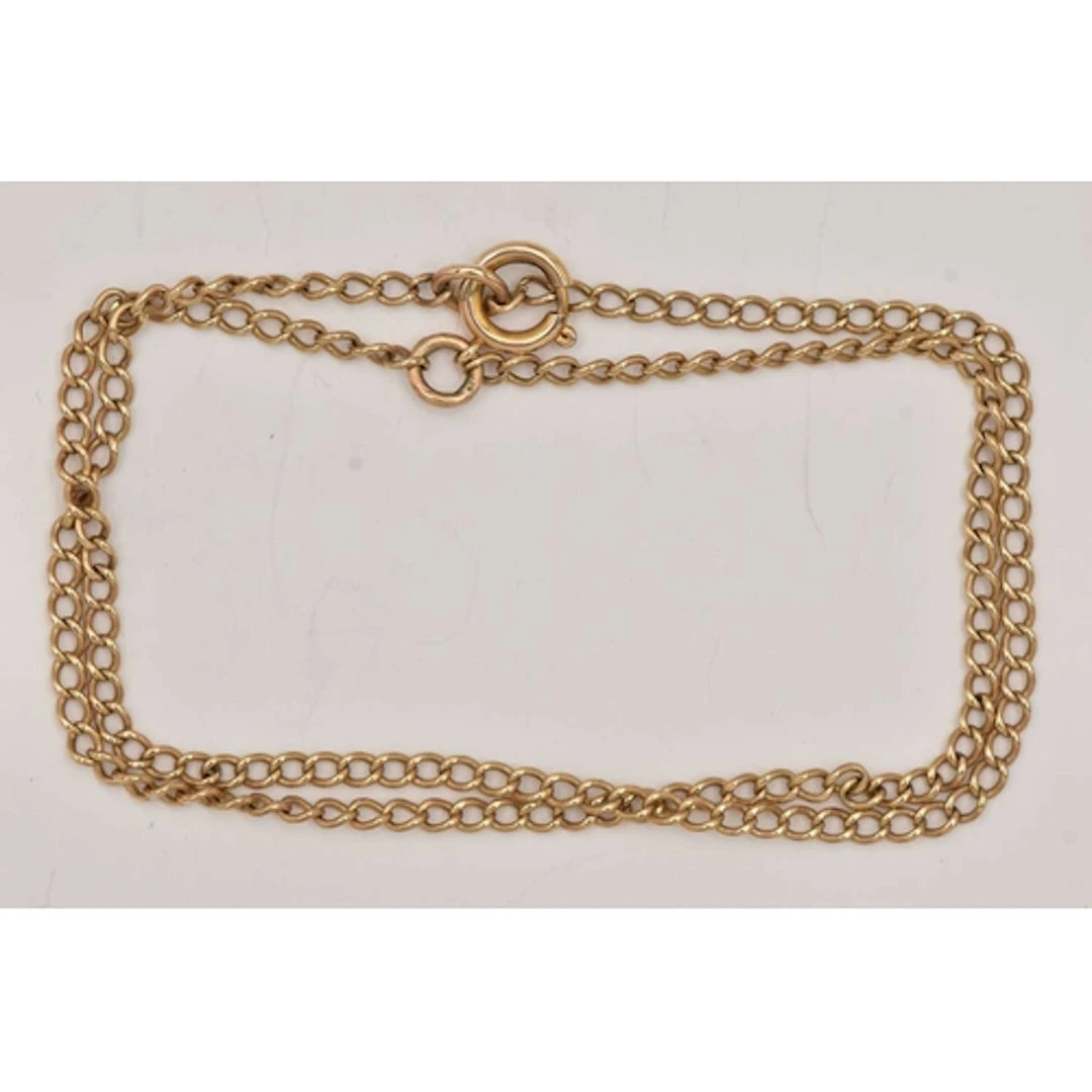 A YELLOW METAL DOUBLE CHAIN BRACELET, two fine curb link cha...