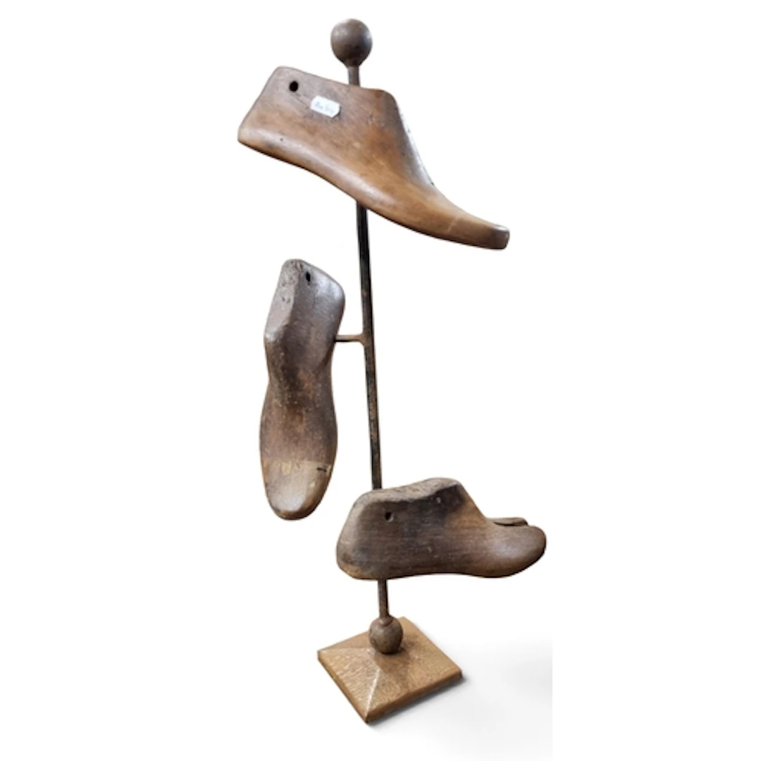 A Metal Display Stand with three tumbler shoe lasts. Would m...