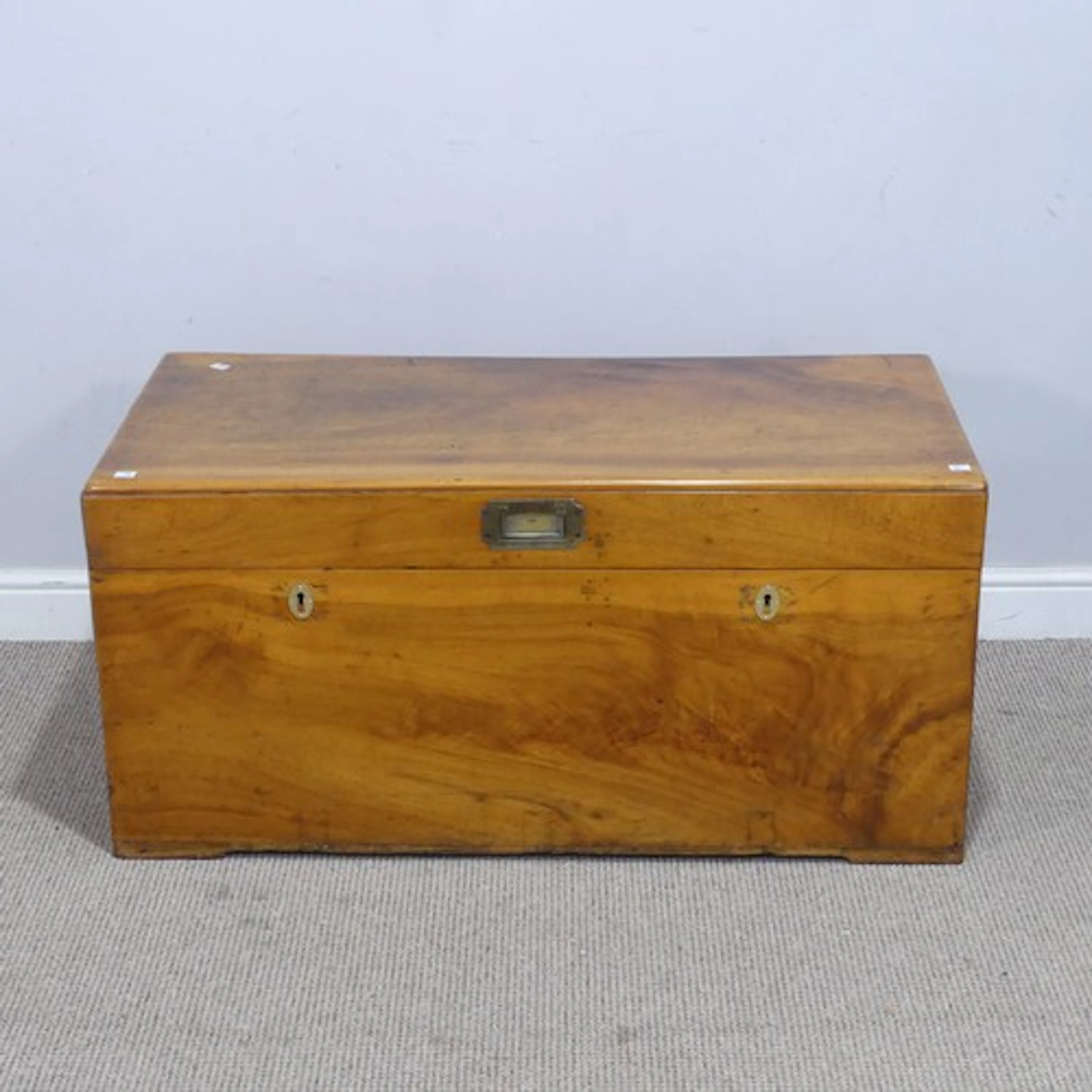 A late 19th century Indian camphorwood Trunk, the top inset ...