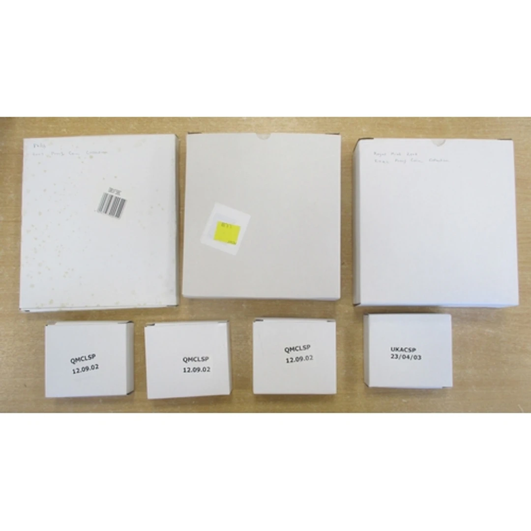 Collection includes boxed silver proof FDC commemoratives in...