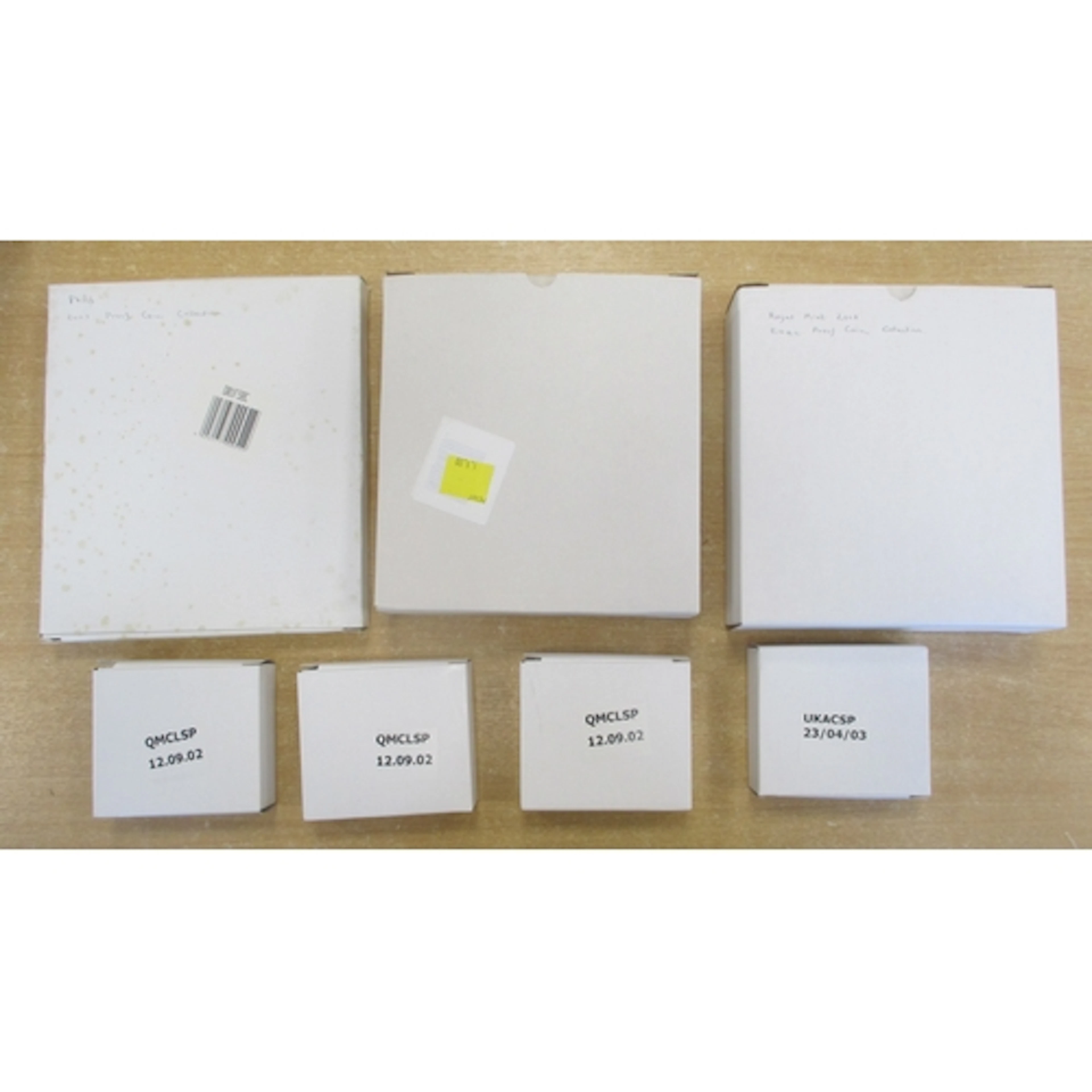 Collection includes boxed silver proof FDC commemoratives in...