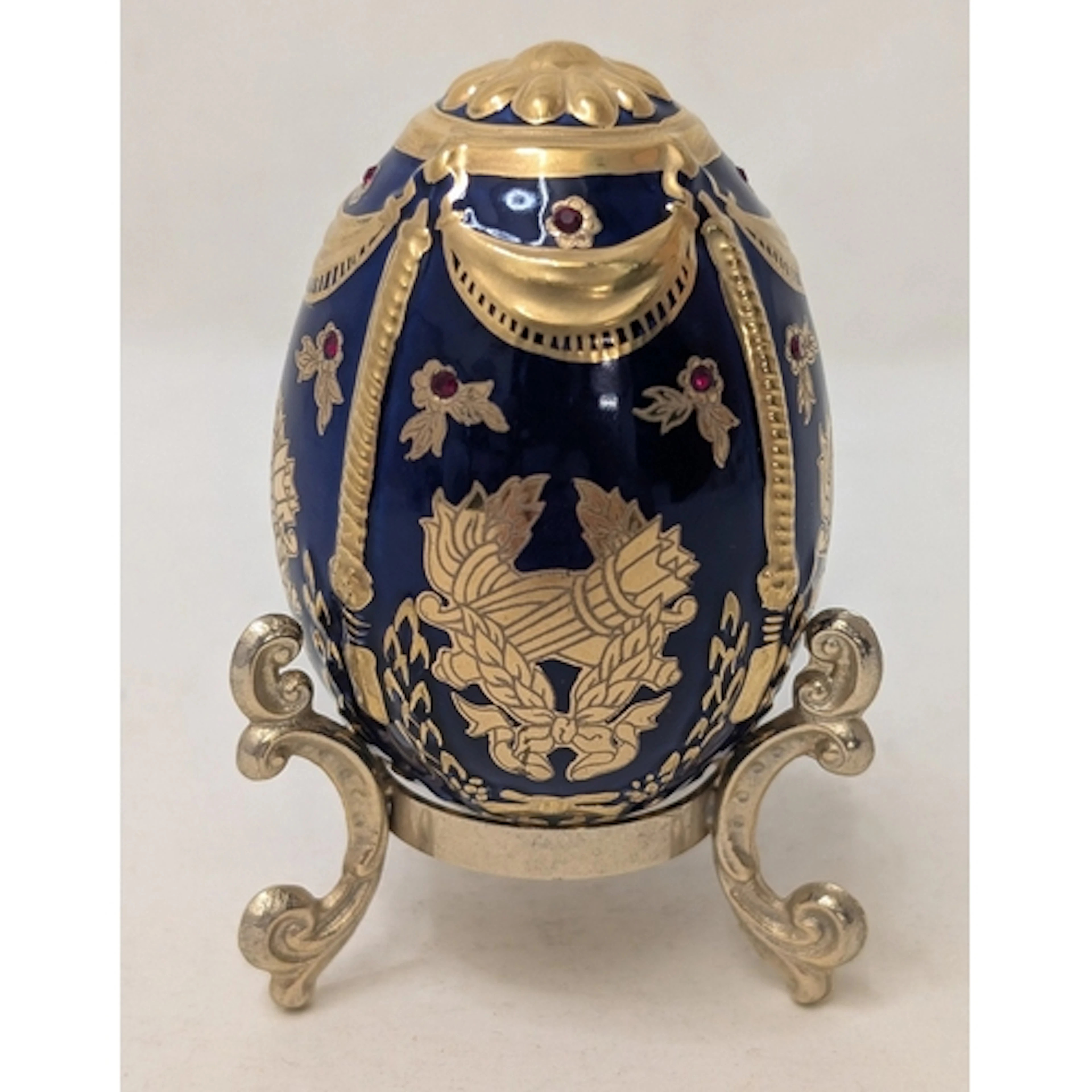 Franklin Mint Faberge Style Egg, cobalt blue ground, ebony g...