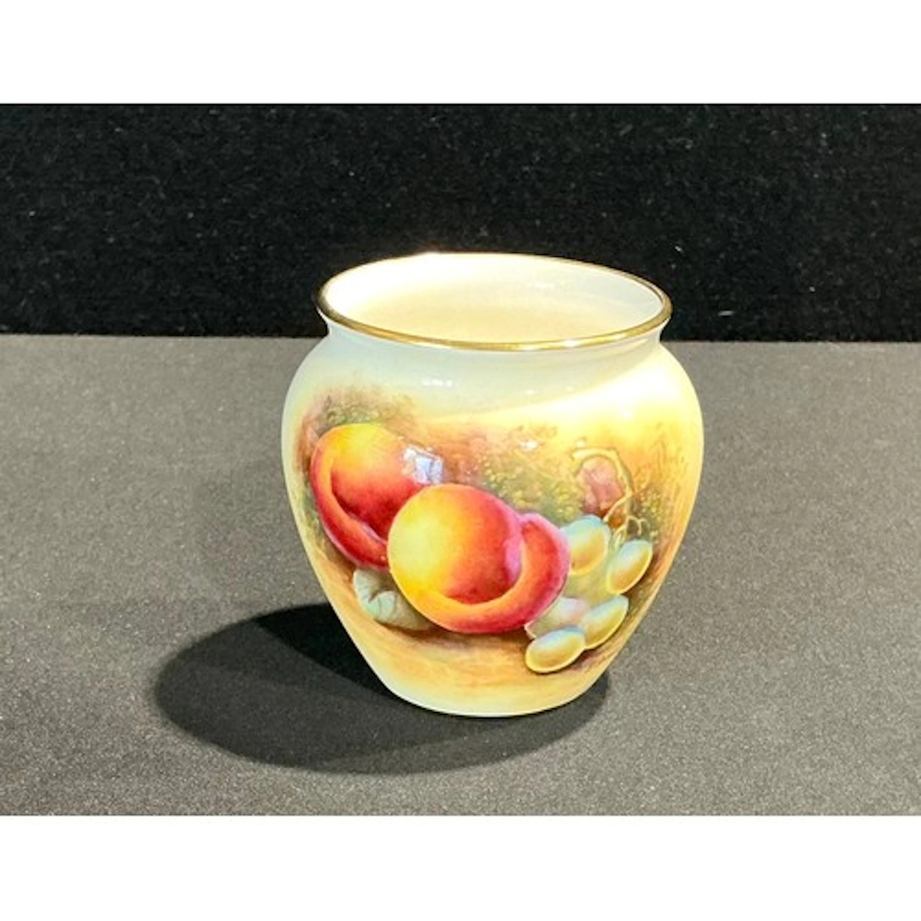A Royal Worcester ovoid vase, painted by David Bowkett, sign...