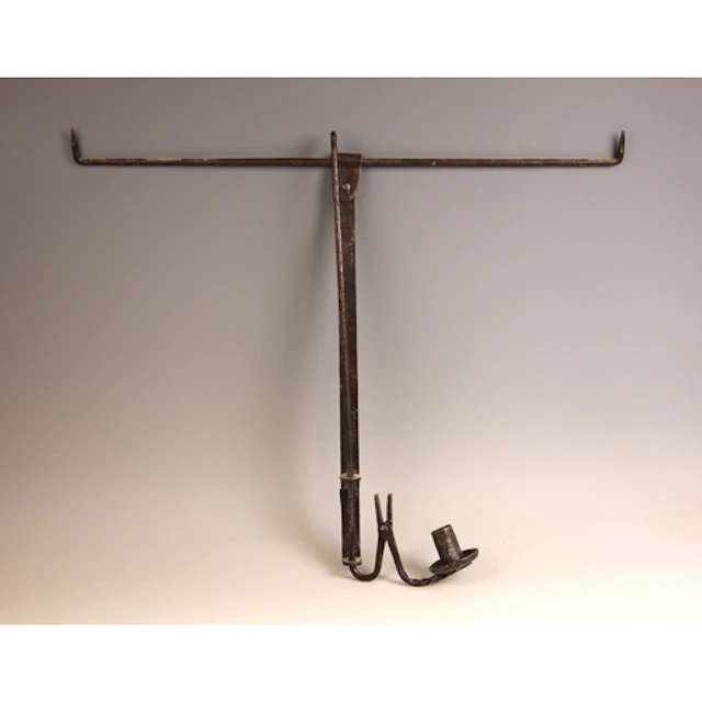 A wrought iron adjustable rise and fall combination rush lig...